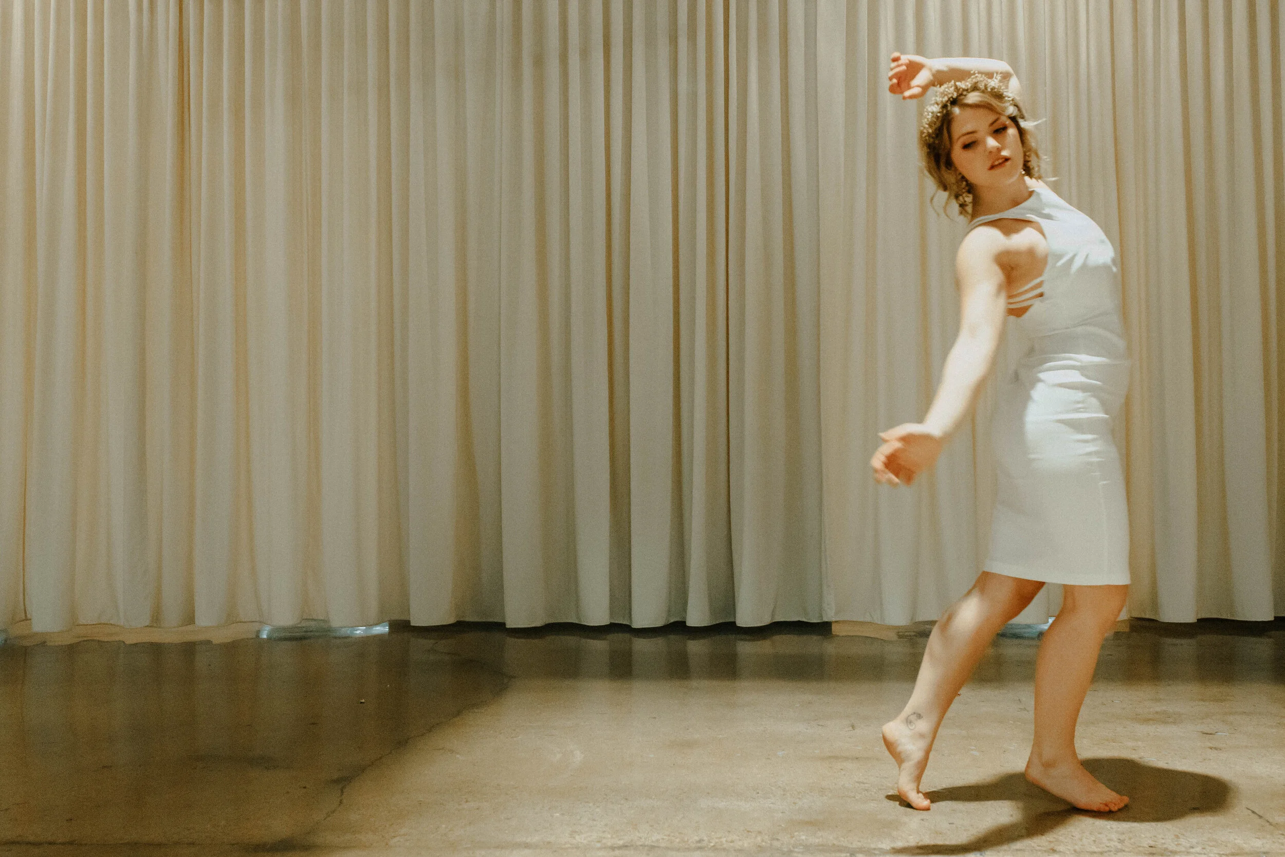 Earthy neutral floral design with flower crown, earrings, and wearable florals. Nashville wedding florist at the Saint Elle.