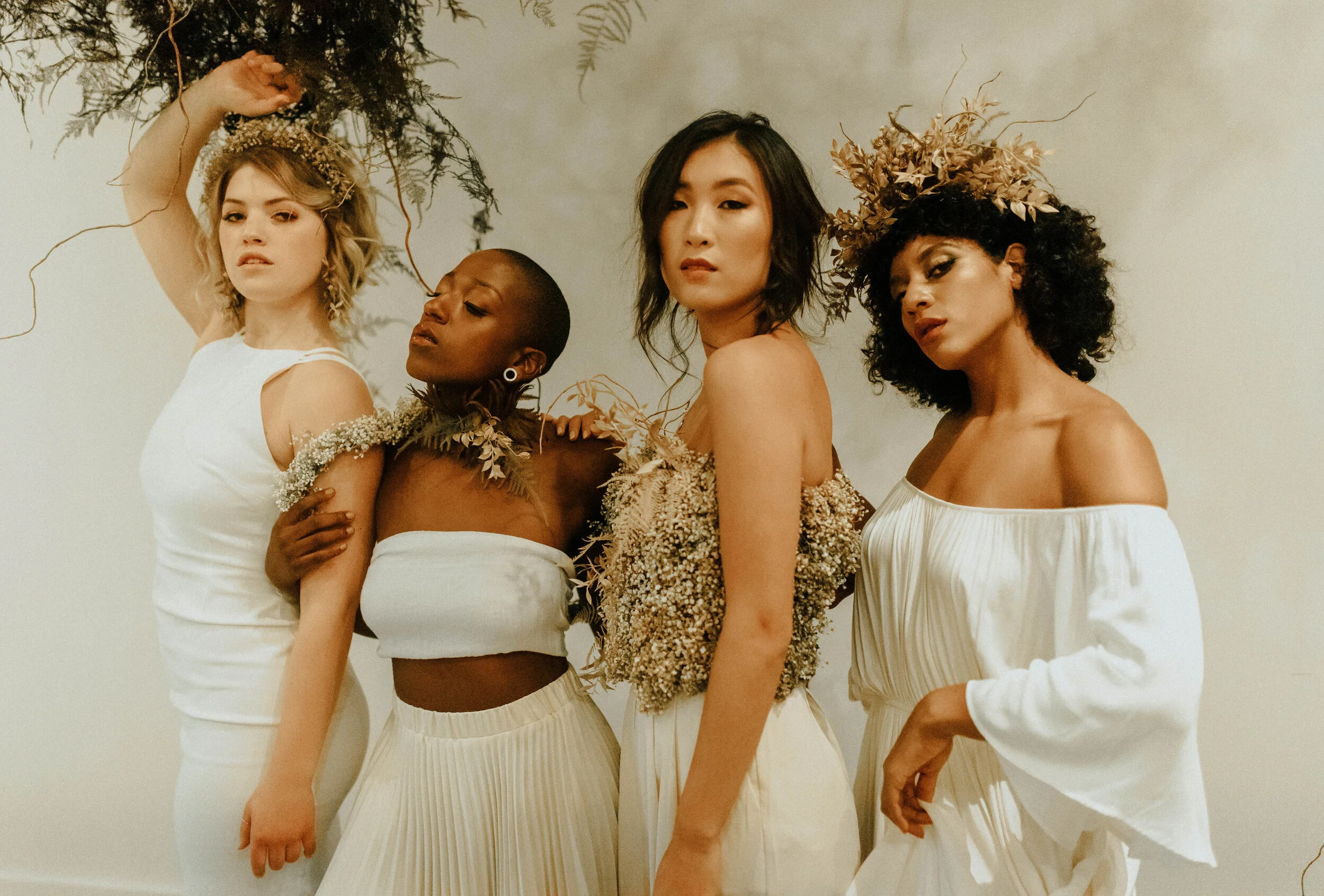Skin tone inspired wearable floral design inspiration shoot. Earth tone hanging flower installation at the Saint Elle, Nashville.