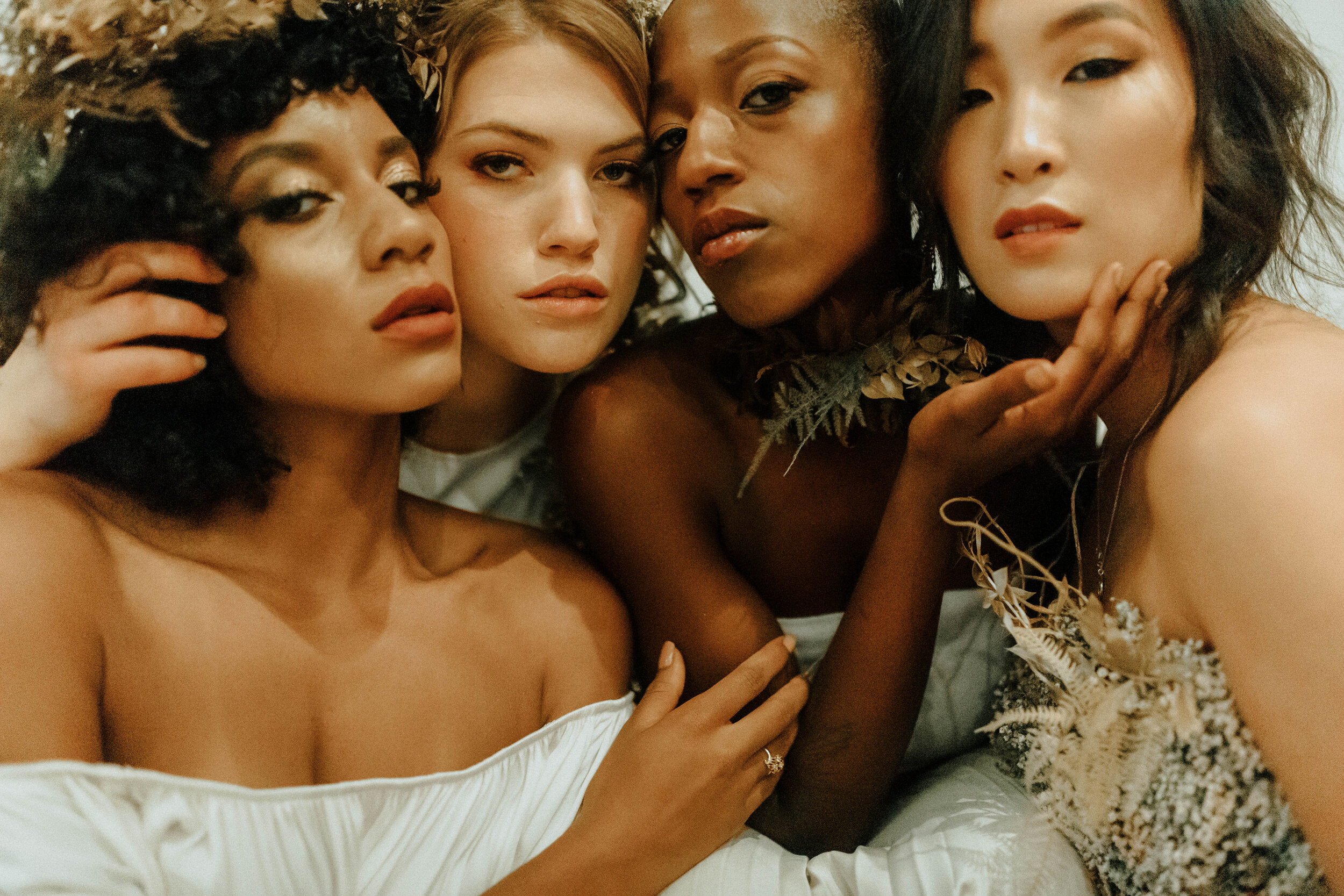 Skin tone inspired wearable floral design inspiration shoot. Earth tone hanging flower installation at the Saint Elle, Nashville.