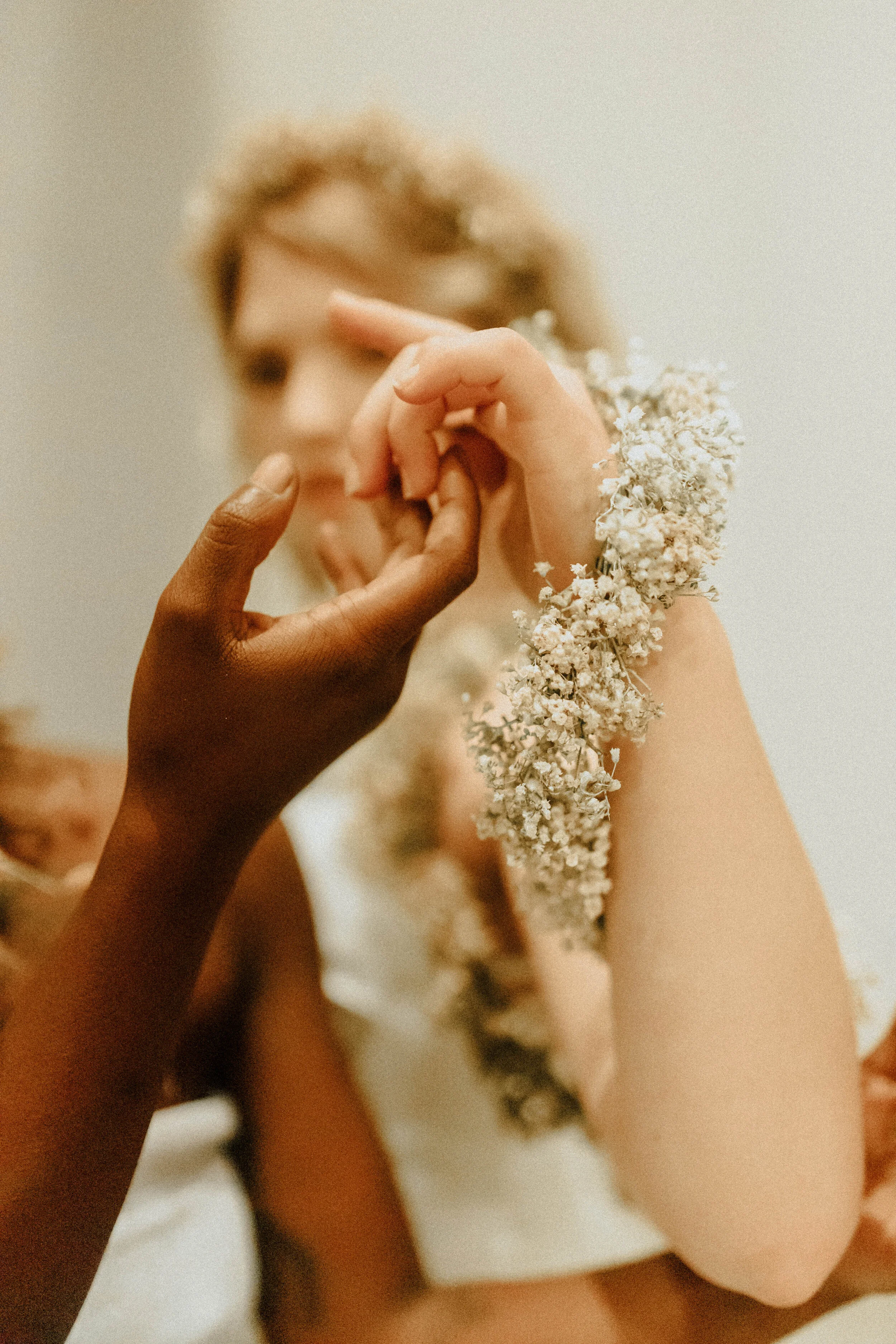 Skin tone inspired wearable floral design inspiration shoot. Earth tone hanging flower installation at the Saint Elle, Nashville.
