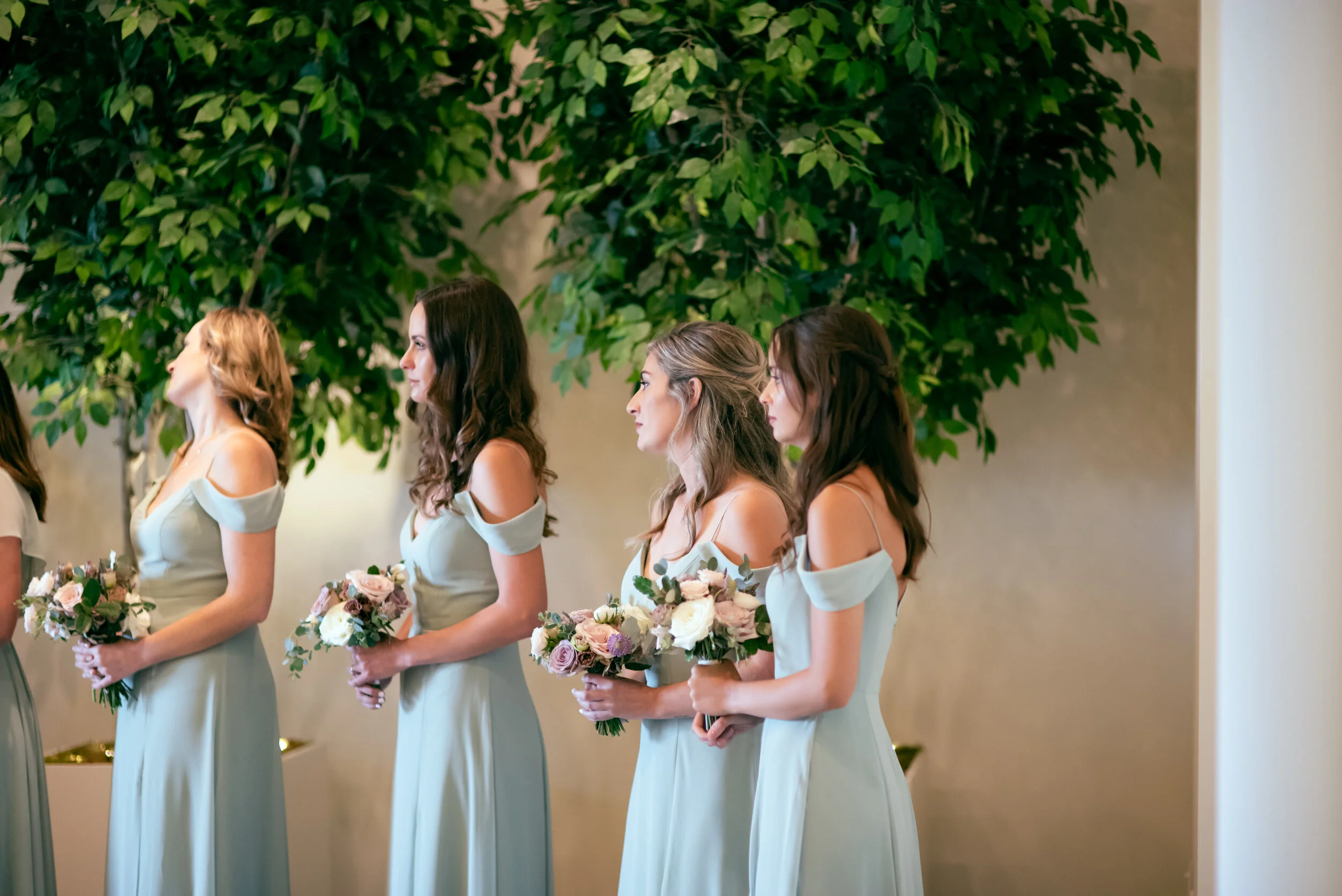 Hexagon floral arch in minimal venue with lots of plants. Lavender and mauve color palette, Nashville wedding floral design.
