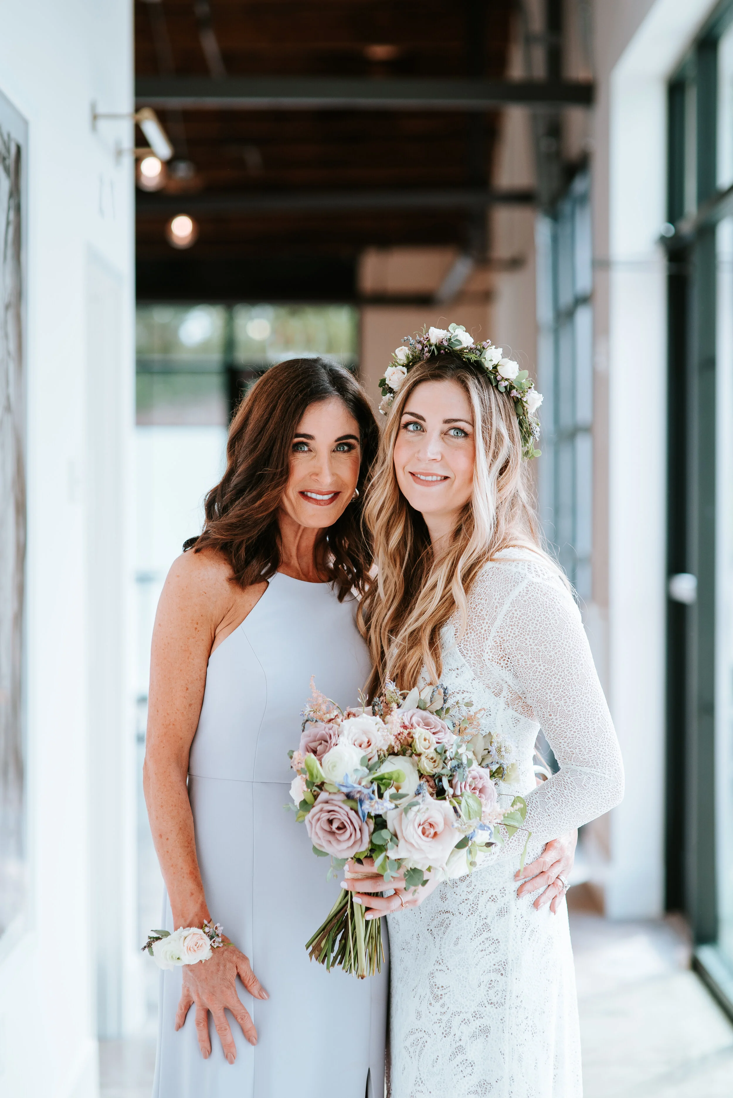 Lavender, mauve, and lilac bridal bouquet with garden roses, ranunculus, astilbe, scabies, clematis, eucalyptus, and greenery. Nashville wedding floral designer at the Saint Elle.