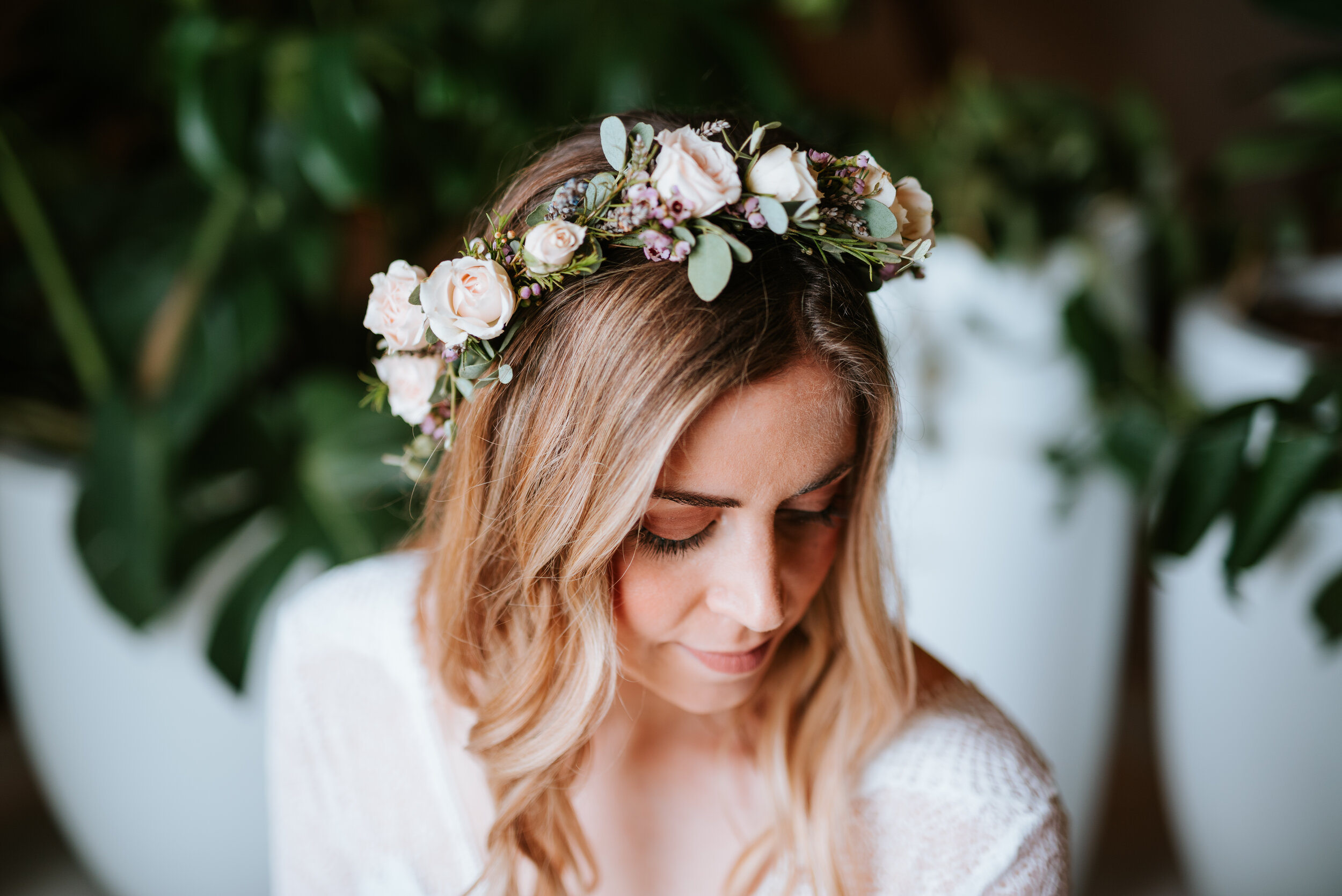 Bride’s flower crown with blush spray roses, wildflowers, eucalyptus, and greenery. Nashville wedding flowers by Rosemary & Finch.