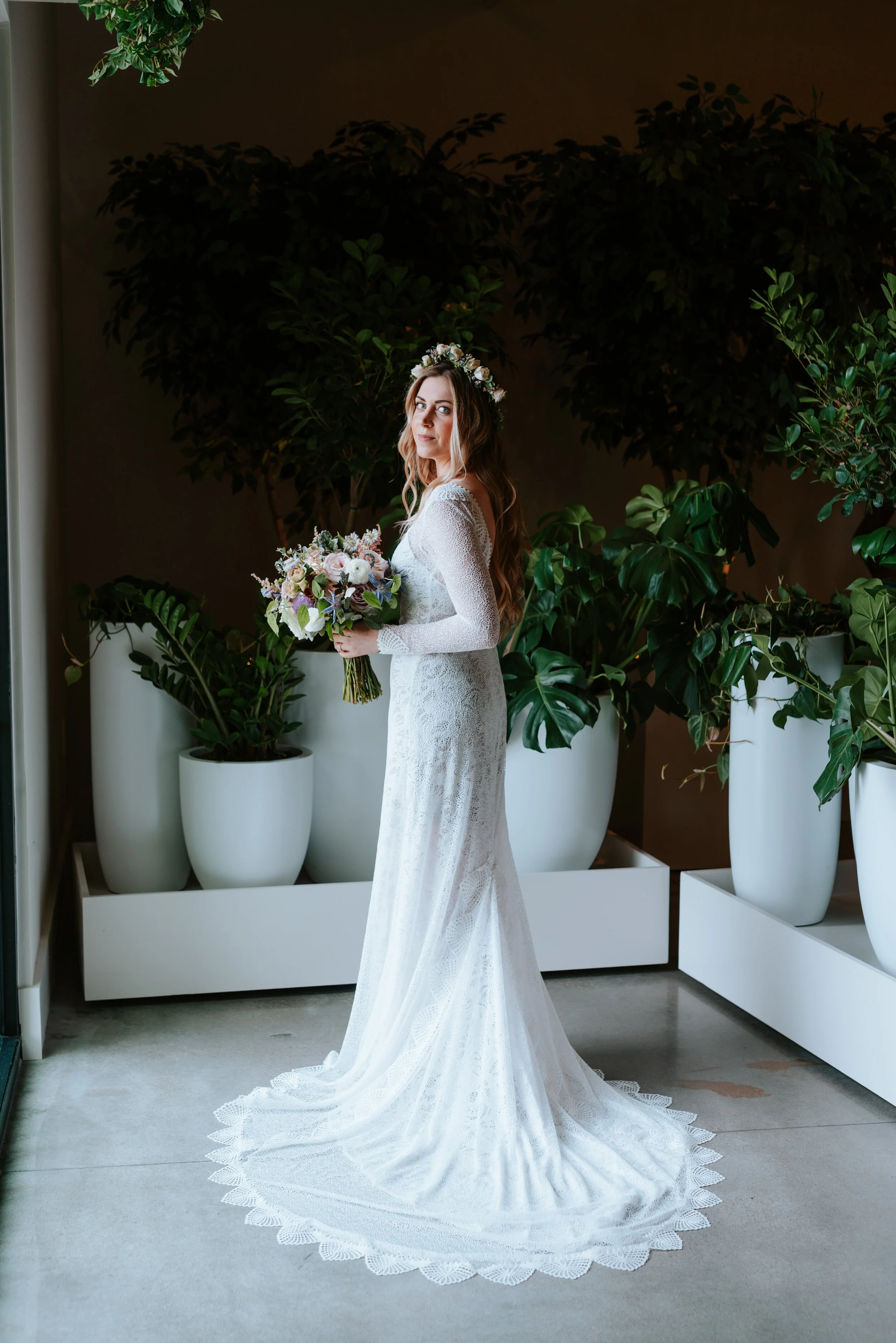 Bride’s flower crown with blush spray roses, wildflowers, eucalyptus, and greenery. Nashville wedding flowers by Rosemary & Finch.