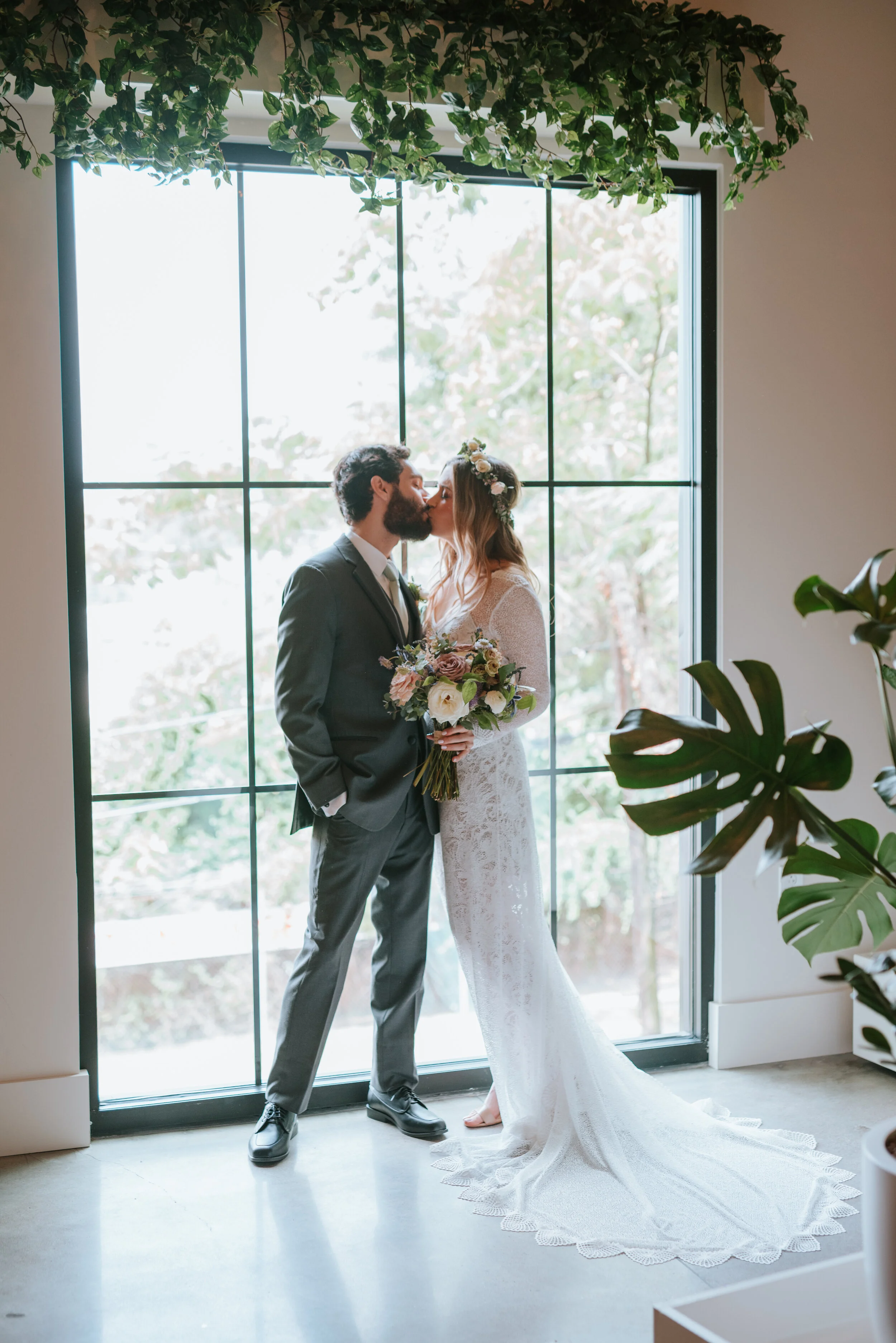 Lavender, mauve, and lilac bridal bouquet with garden roses, ranunculus, astilbe, scabies, clematis, eucalyptus, and greenery. Nashville wedding floral designer at the Saint Elle.
