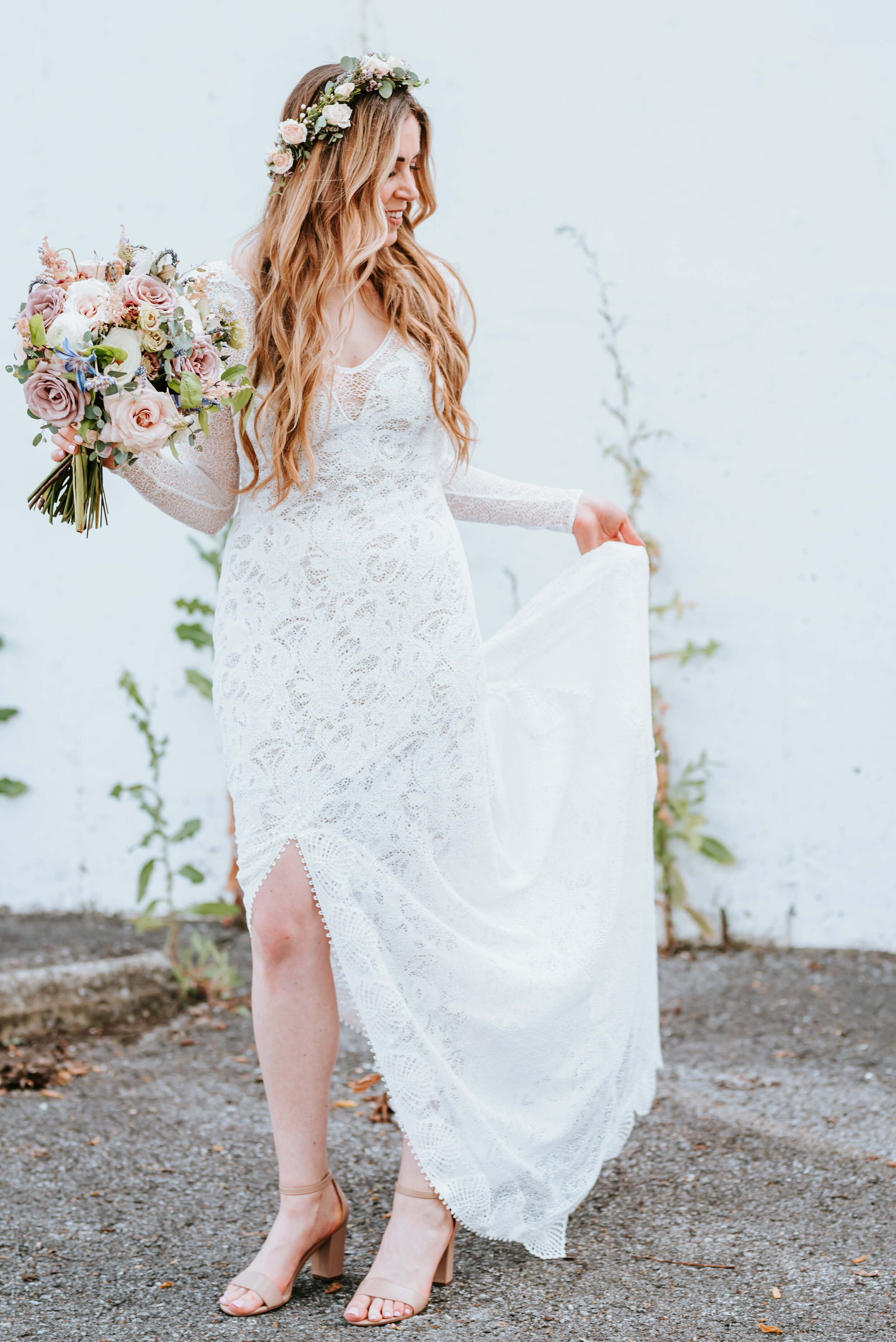Lavender, mauve, and lilac bridal bouquet with garden roses, ranunculus, astilbe, scabies, clematis, eucalyptus, and greenery. Nashville wedding floral designer at the Saint Elle.