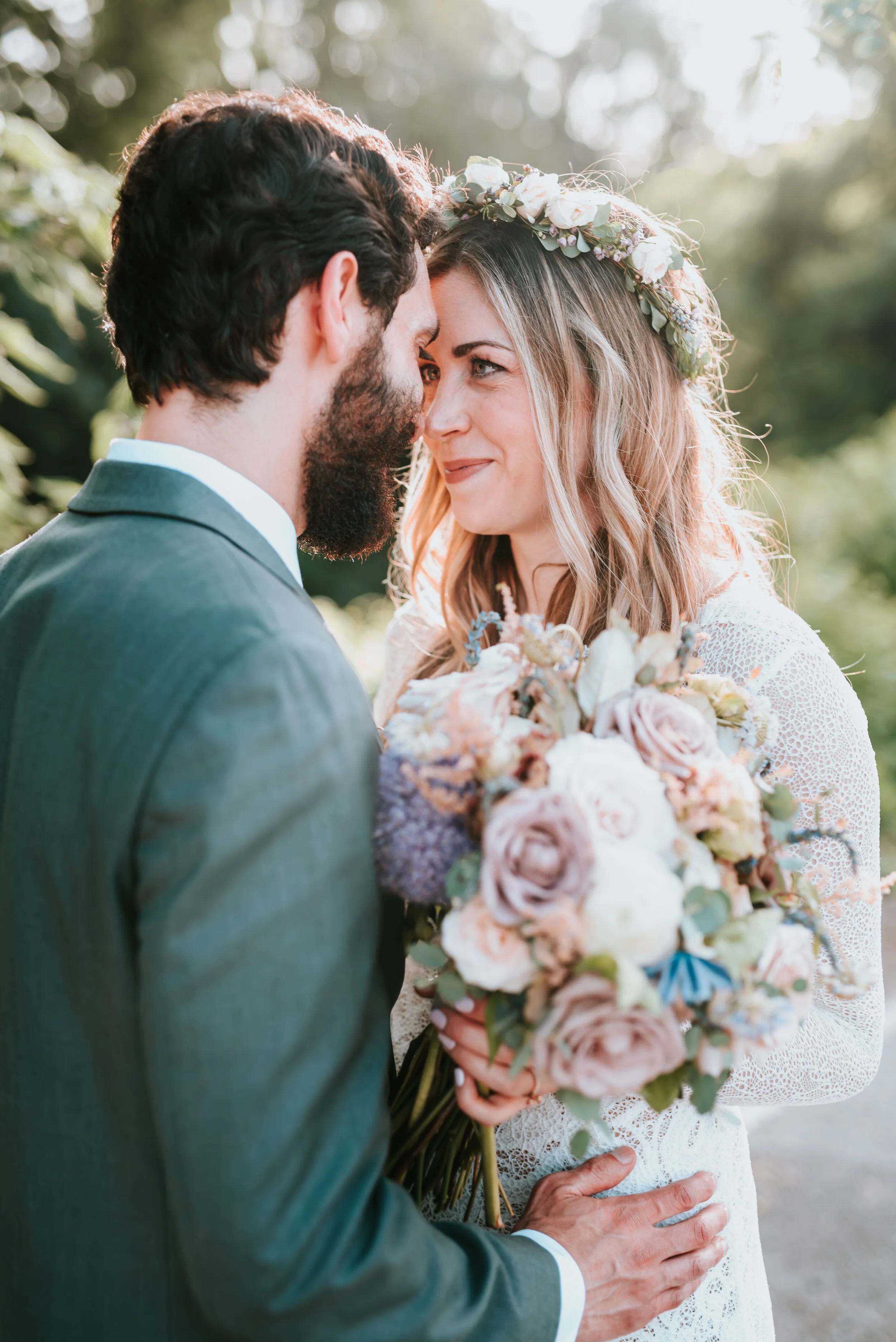 Lavender, mauve, and lilac bridal bouquet with garden roses, ranunculus, astilbe, scabies, clematis, eucalyptus, and greenery. Nashville wedding floral designer at the Saint Elle.
