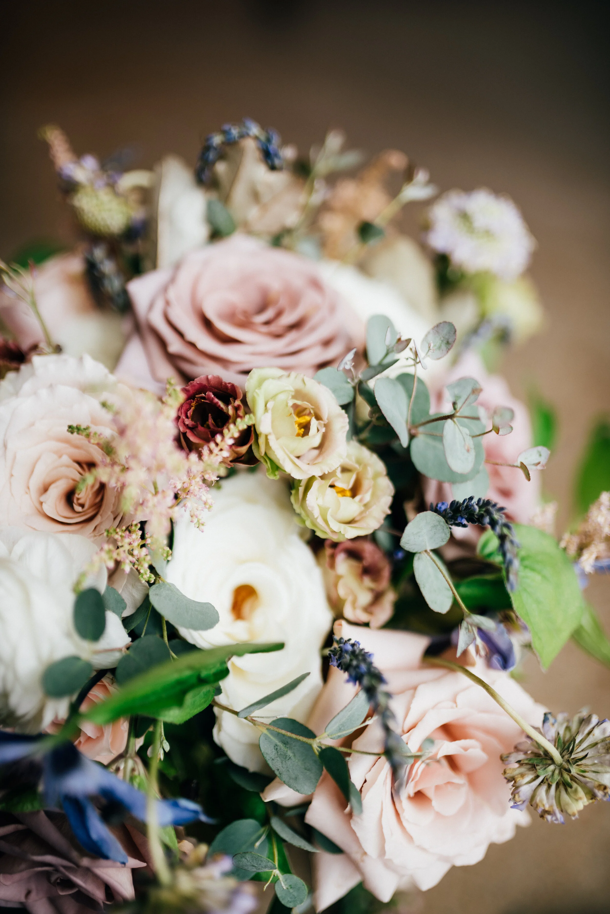 Lavender, mauve, and lilac flowers for a June wedding at the Saint Elle, Nashville.