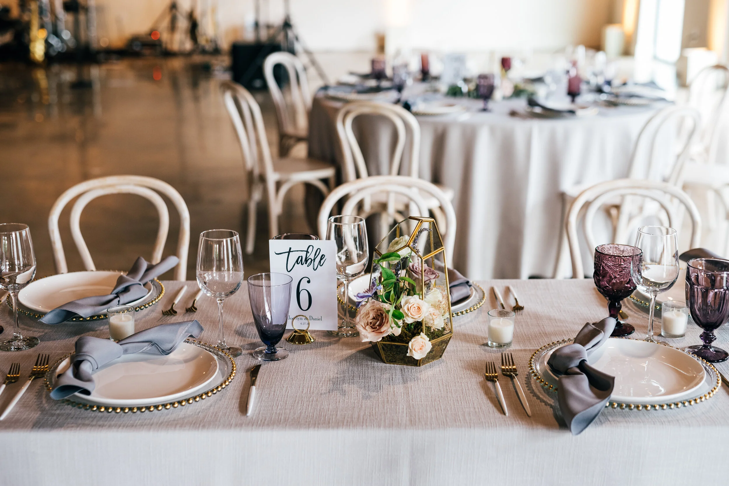 Gold geometric terrarium centerpieces with eucalyptus and lavender florals. Nashville wedding florist at the Saint Elle.