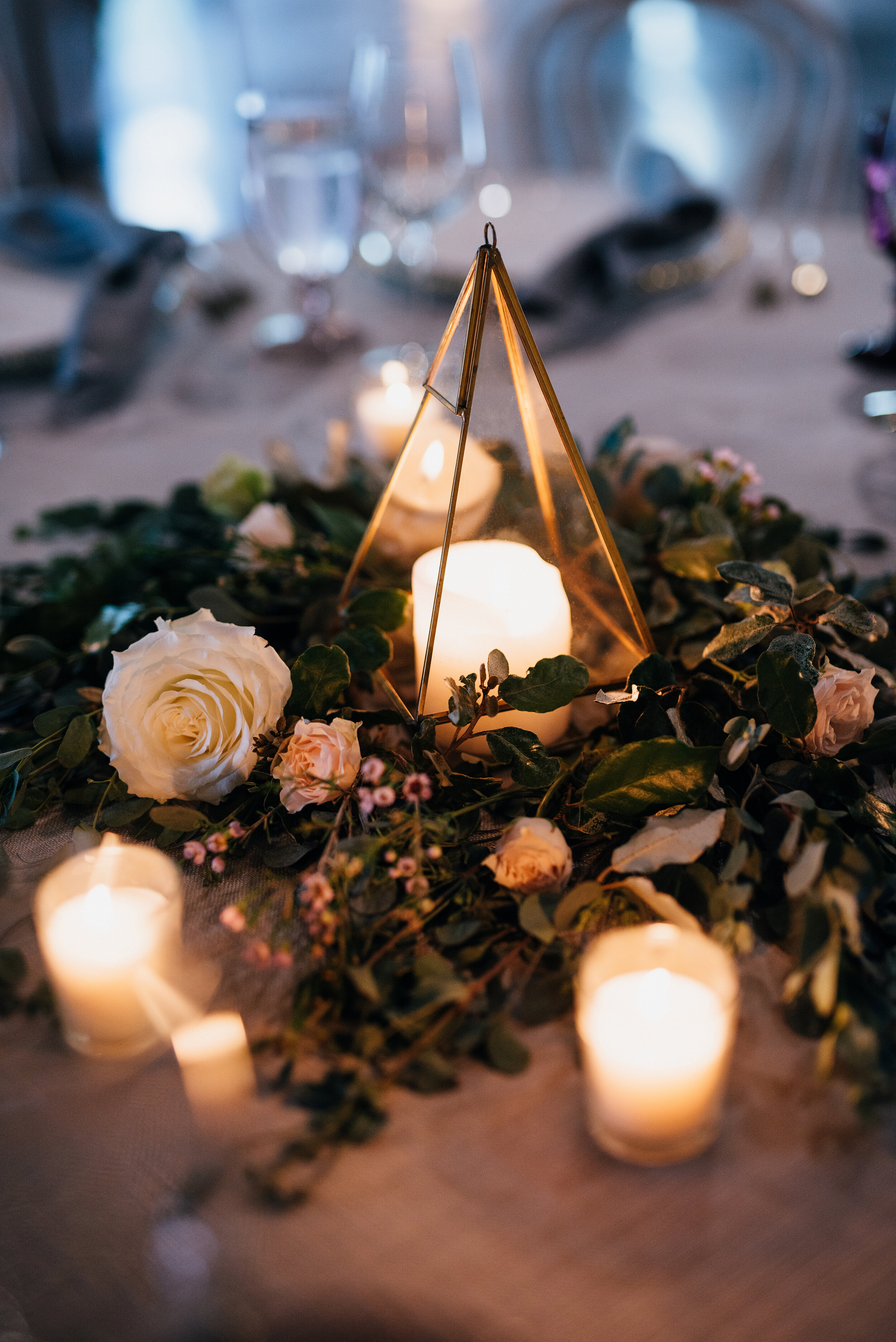 Gold geometric terrarium centerpieces with eucalyptus and lavender florals. Nashville wedding florist at the Saint Elle.