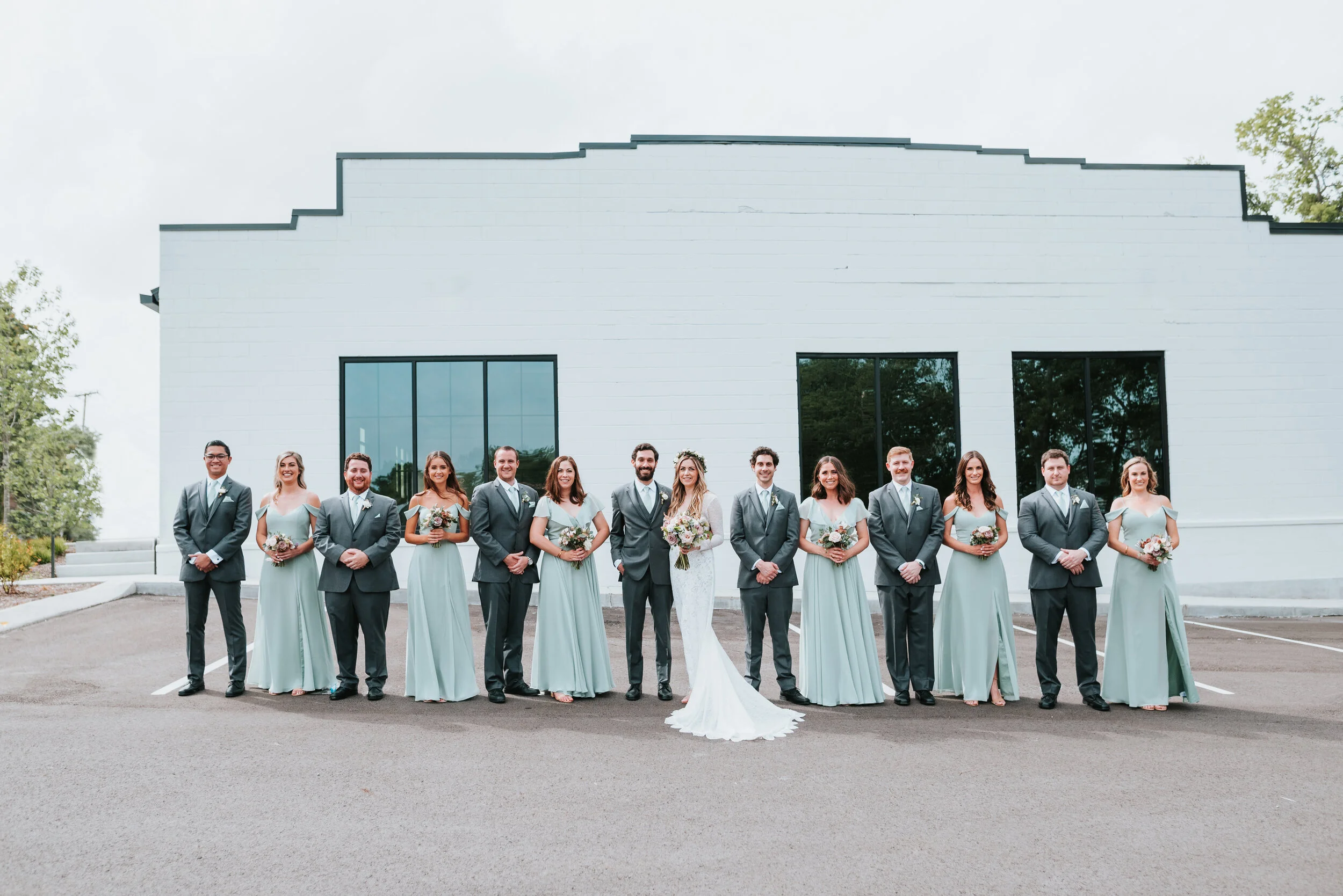 Lavender, mauve, and lilac bridal bouquet with garden roses, ranunculus, astilbe, scabies, clematis, eucalyptus, and greenery. Nashville wedding floral designer at the Saint Elle.