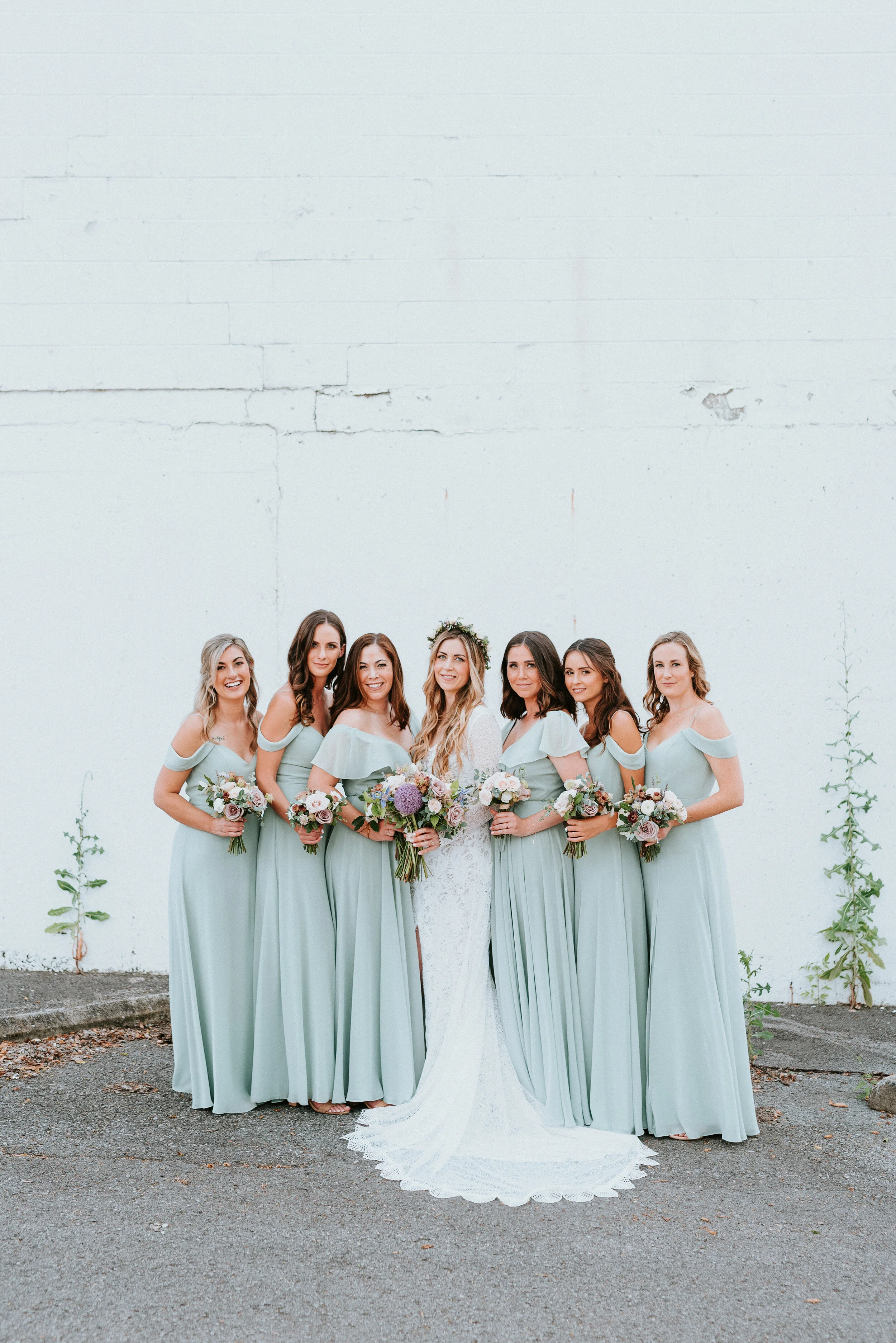 Lavender, mauve, and lilac bridal bouquet with garden roses, ranunculus, astilbe, scabies, clematis, eucalyptus, and greenery. Nashville wedding floral designer at the Saint Elle.