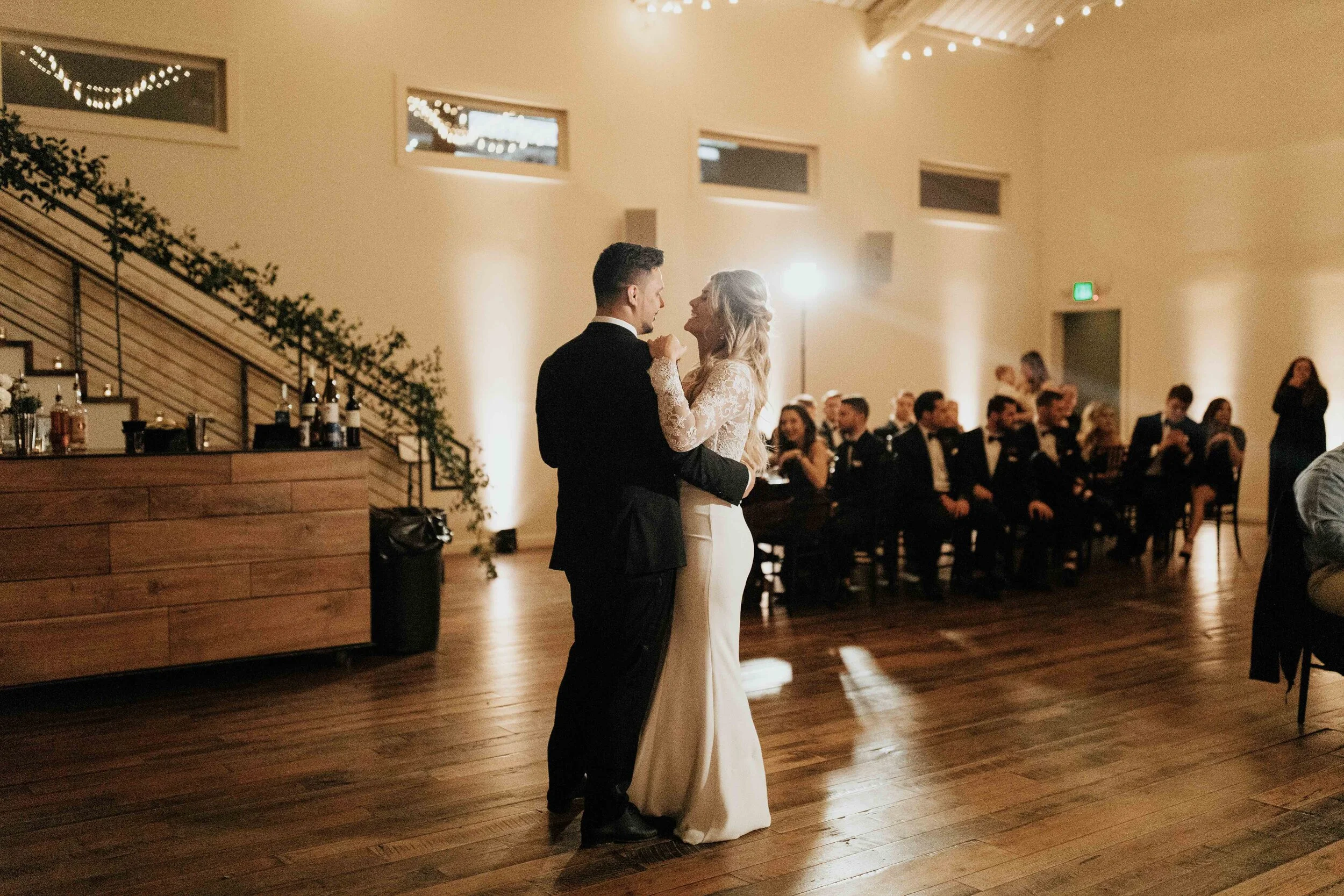 Greenery growing up the bannister in the Cordelle. Nashville wedding florist.