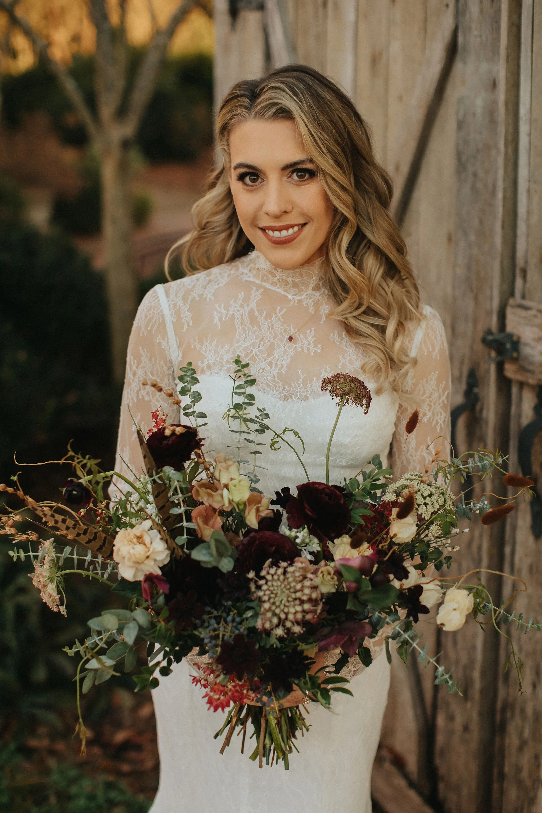 A perfect botanical and moody bouquet filled with Chocolate Cosmos, Queen Ann's Lace, Baby Eucalyptus, Rust Bunny Tails, Festival Bush, Antique Carnations, Burgundy Ranunculus, and Brown Lisianthus. Designed by Nashville wedding floral designer, Ros…