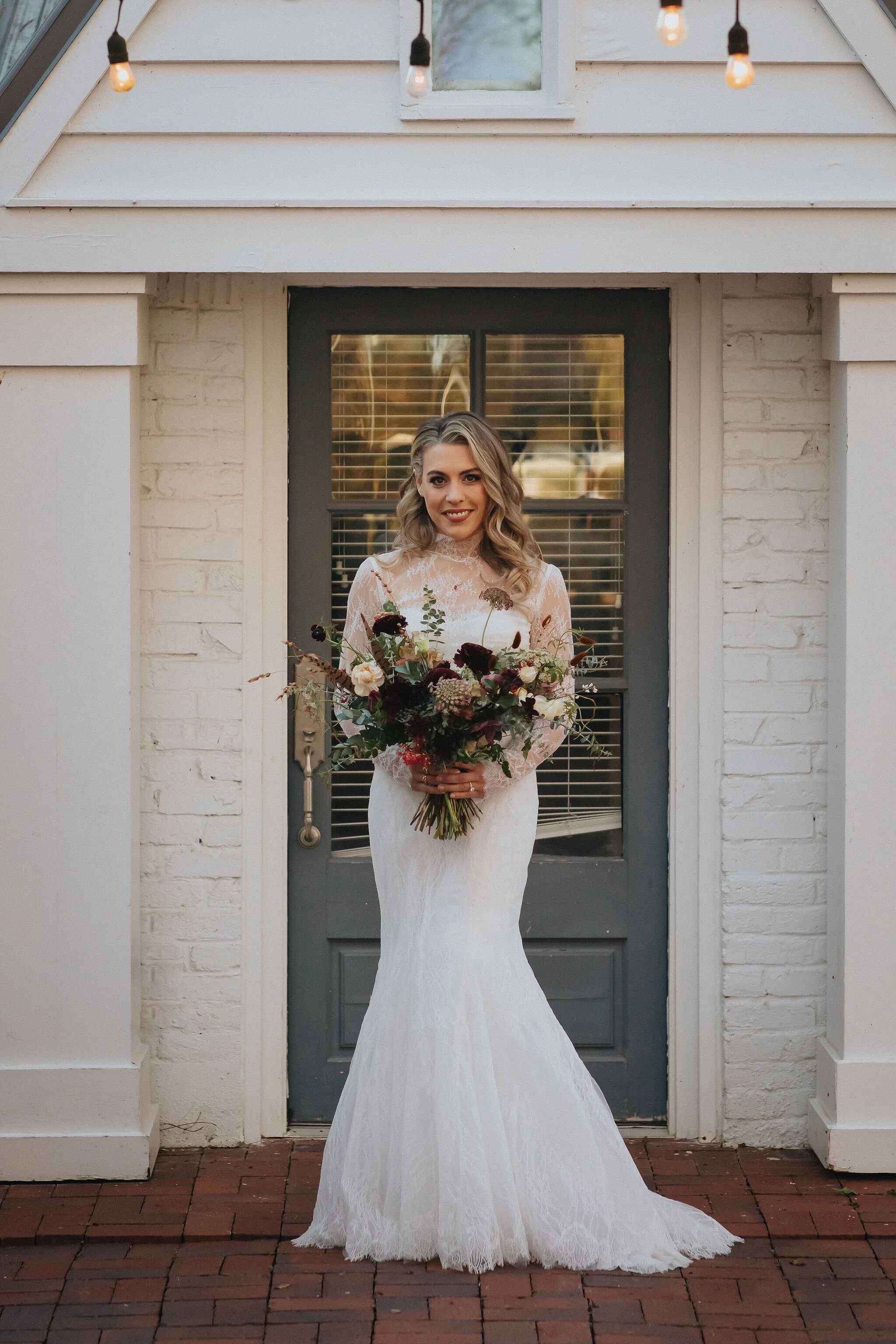 A perfect botanical and moody Bridal bouquet filled with Chocolate Cosmos, Queen Ann's Lace, Baby Eucalyptus, Rust Bunny Tails, Festival Bush, Antique Carnations, Burgundy Ranunculus, and Brown Lisianthus. Designed by Nashville wedding floral design…