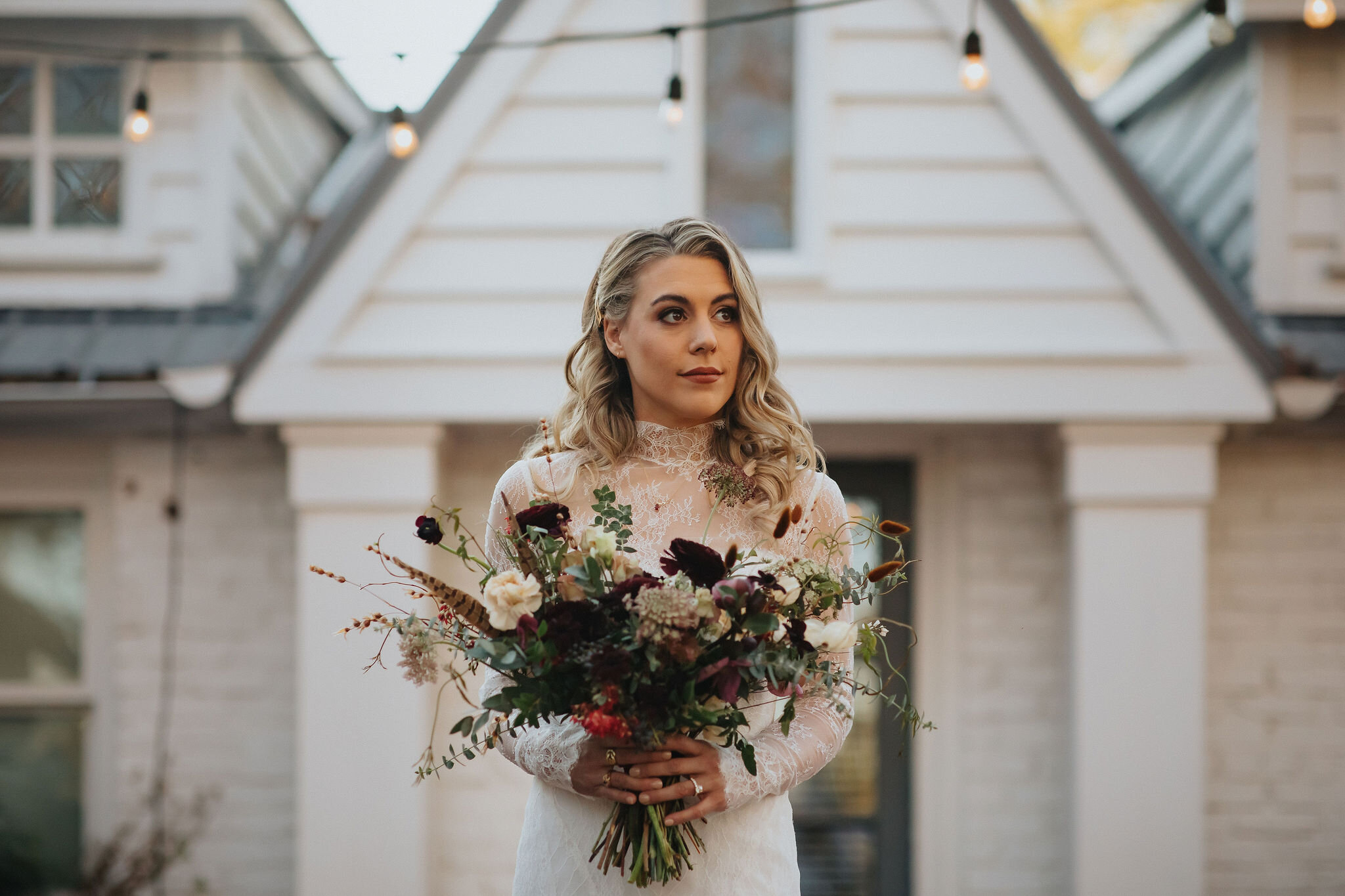 A perfect botanical and moody Bridal bouquet filled with Chocolate Cosmos, Queen Ann's Lace, Baby Eucalyptus, Rust Bunny Tails, Festival Bush, Antique Carnations, Burgundy Ranunculus, and Brown Lisianthus. Designed by Nashville wedding floral design…