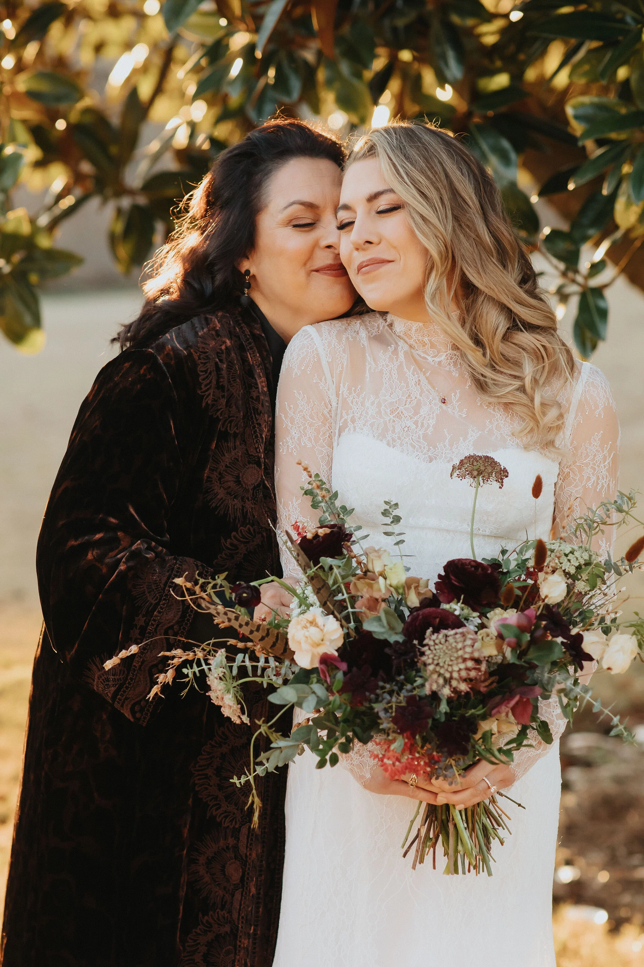 A perfect botanical and moody Bridal bouquet filled with Chocolate Cosmos, Queen Ann's Lace, Baby Eucalyptus, Rust Bunny Tails, Festival Bush, Antique Carnations, Burgundy Ranunculus, and Brown Lisianthus. Designed by Nashville wedding floral design…