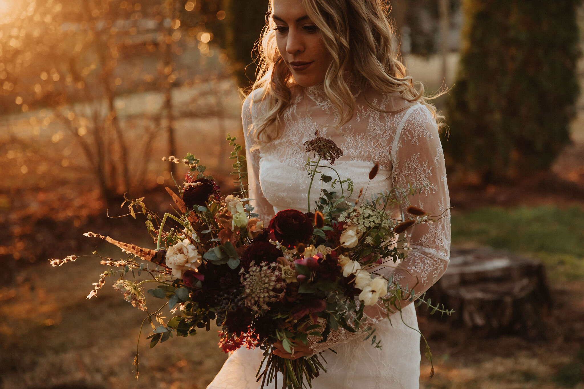 A perfect botanical and moody Bridal bouquet filled with Chocolate Cosmos, Queen Ann's Lace, Baby Eucalyptus, Rust Bunny Tails, Festival Bush, Antique Carnations, Burgundy Ranunculus, and Brown Lisianthus. Designed by Nashville wedding floral design…