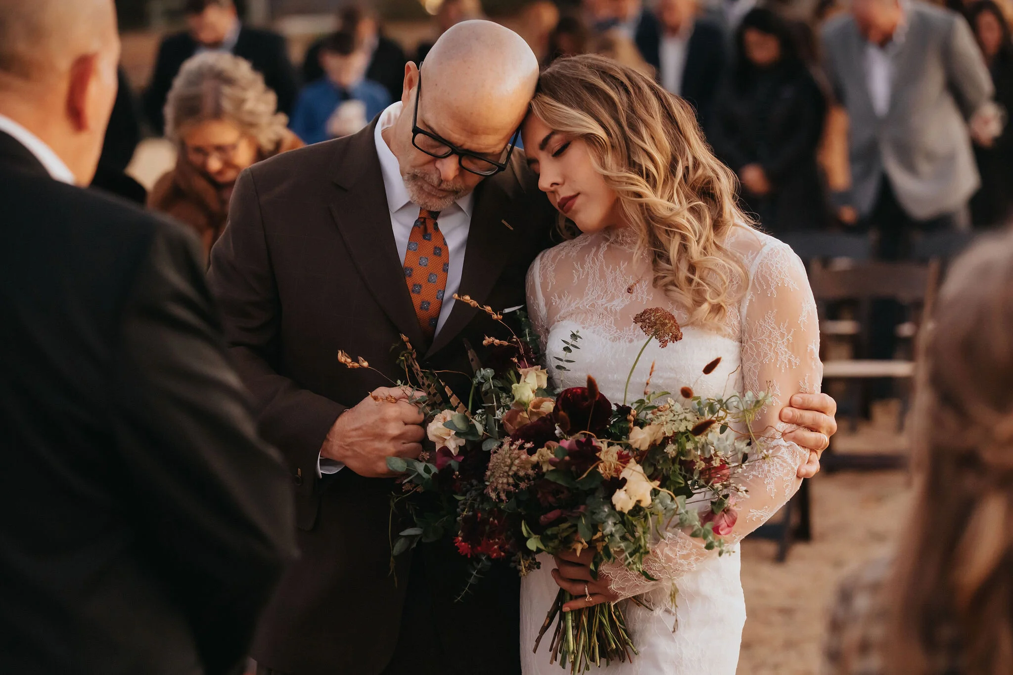 A perfect botanical and moody Bridal bouquet filled with Chocolate Cosmos, Queen Ann's Lace, Baby Eucalyptus, Rust Bunny Tails, Festival Bush, Antique Carnations, Burgundy Ranunculus, and Brown Lisianthus. Designed by Nashville wedding floral design…