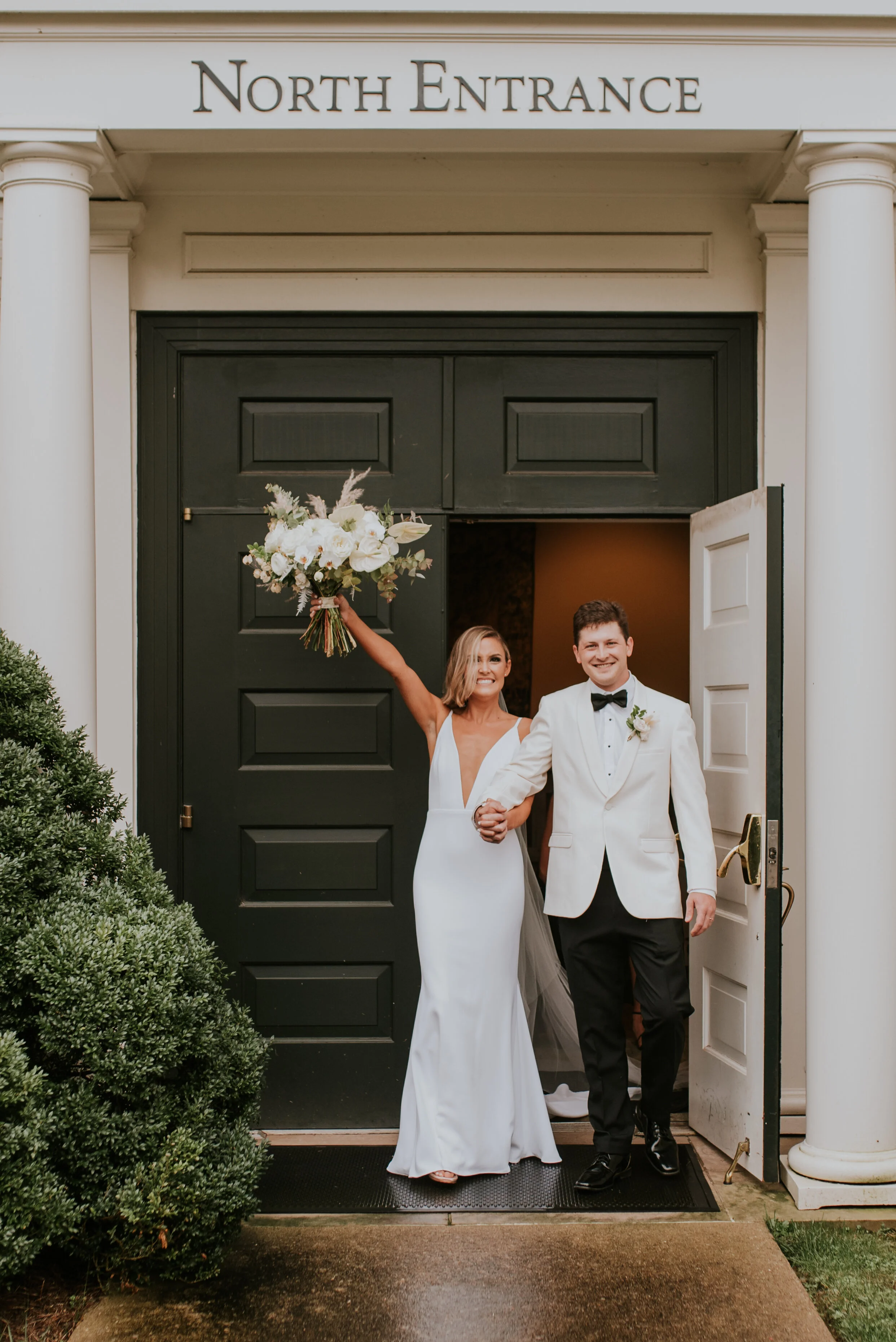 Bohemian and modern yet classically elegant. This Bridal bouquet perfectly married boho elements of pampas grass, eucalyptus, and dried florals with topical stems of anthurium, orchid and ranunculus for a fresh take on white. Designed by Nashville w…