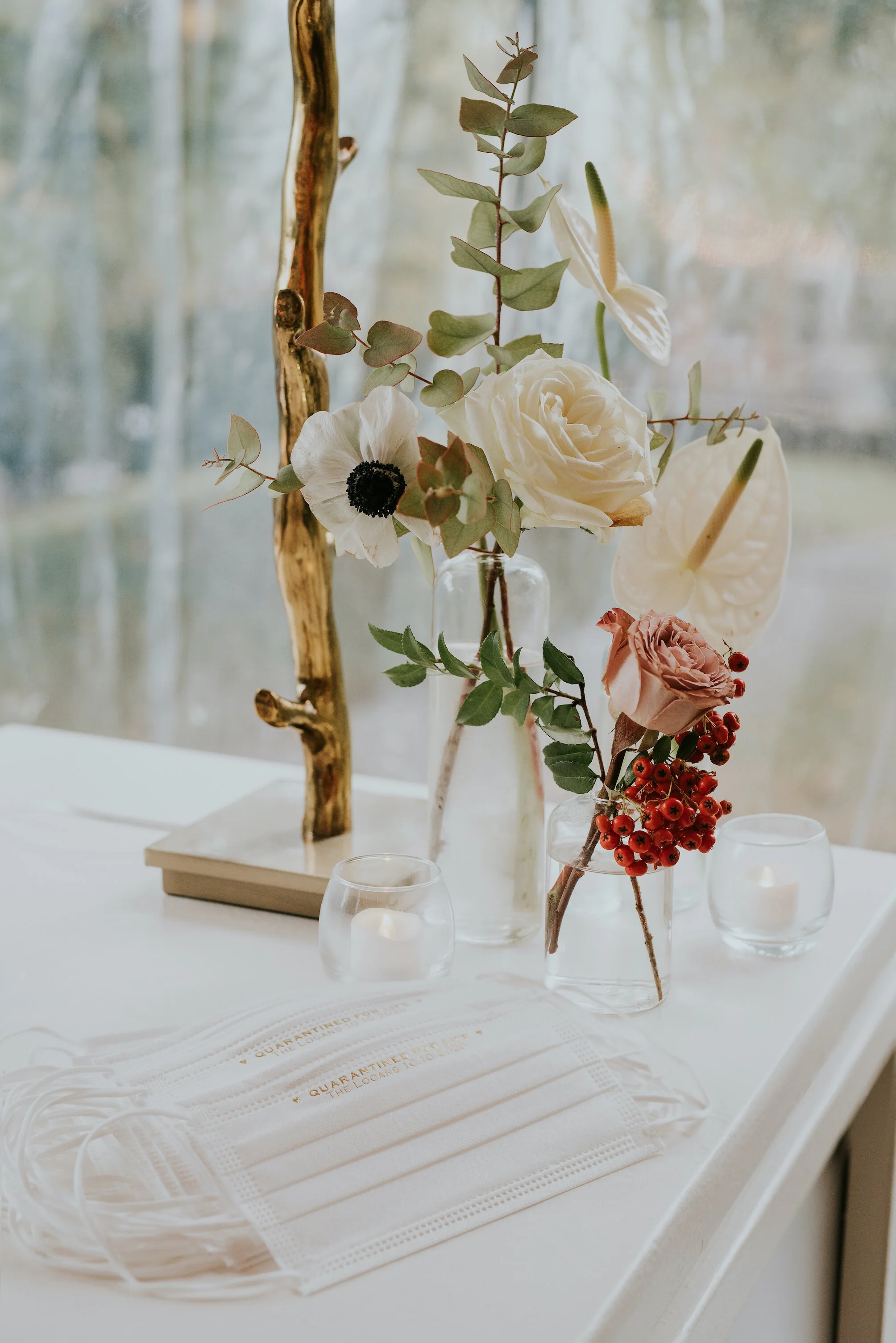 Bohemian and modern yet classically elegant. This wedding perfectly married boho elements of pampas grass, eucalyptus, and dried florals with topical stems of anthurium and orchid. Quicksand roses, cappuccino roses, ilex berry, and rust fern add a p…