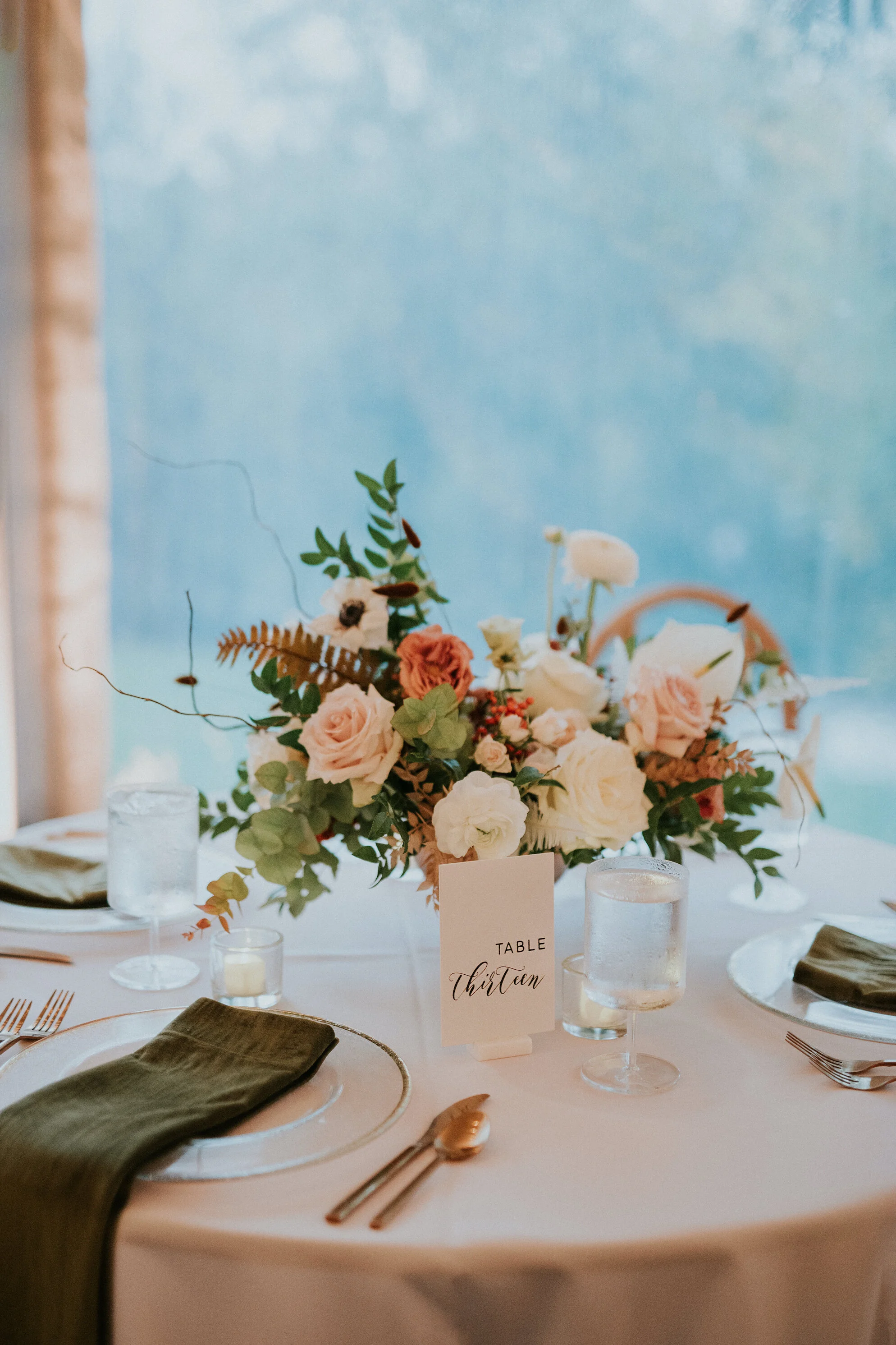 Bohemian and modern yet classically elegant. This wedding perfectly married boho elements of pampas grass, eucalyptus, and dried florals with topical stems of anthurium and orchid. Quicksand roses, cappuccino roses, ilex berry, and rust fern add a p…