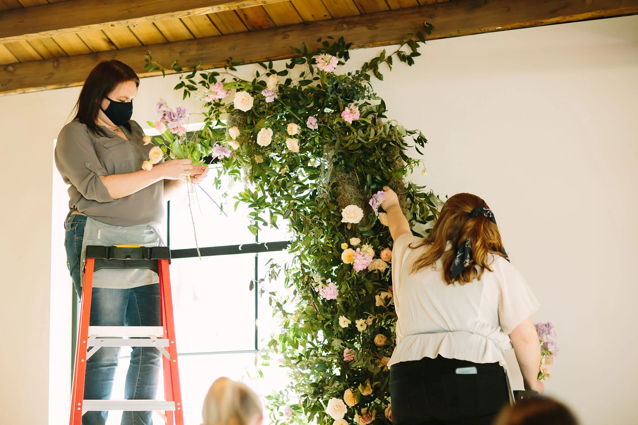 An intimate installation intensive at The Saint Elle in Nashville. Students learned how to create and build 3 different kinds of installations. This climbing window install is filled with flowers in pastel hues including petal heavy roses, lavender …