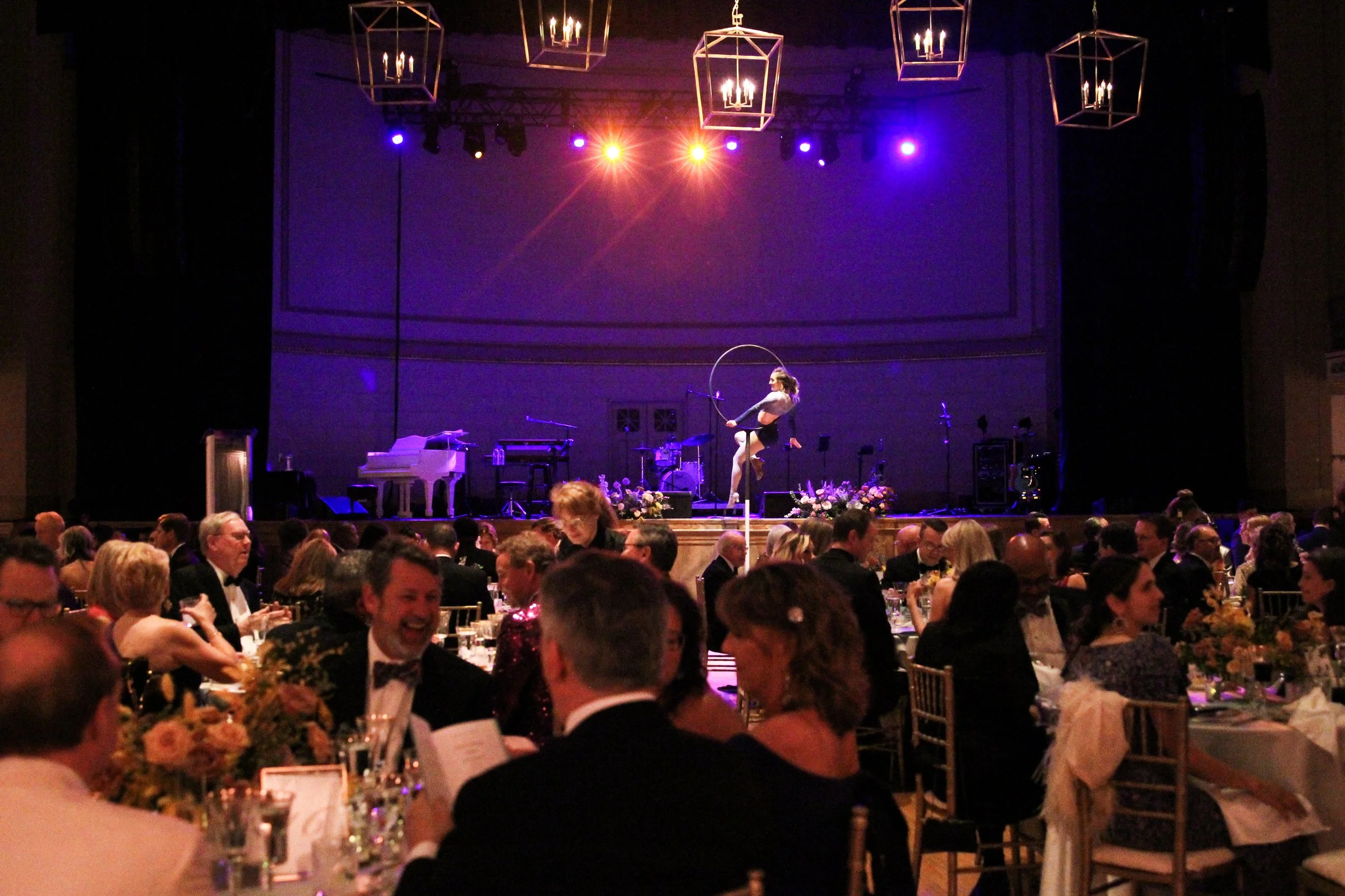 Modern and colorful centerpieces create a lively space for the TPAC Gala in Nashville, TN. Color-blocked floral hues of pink, red, yellow, blue comprised of roses, hydrangeas, tulips, ranunculus, pampas grass, carnations, and sweet peas. Designed by