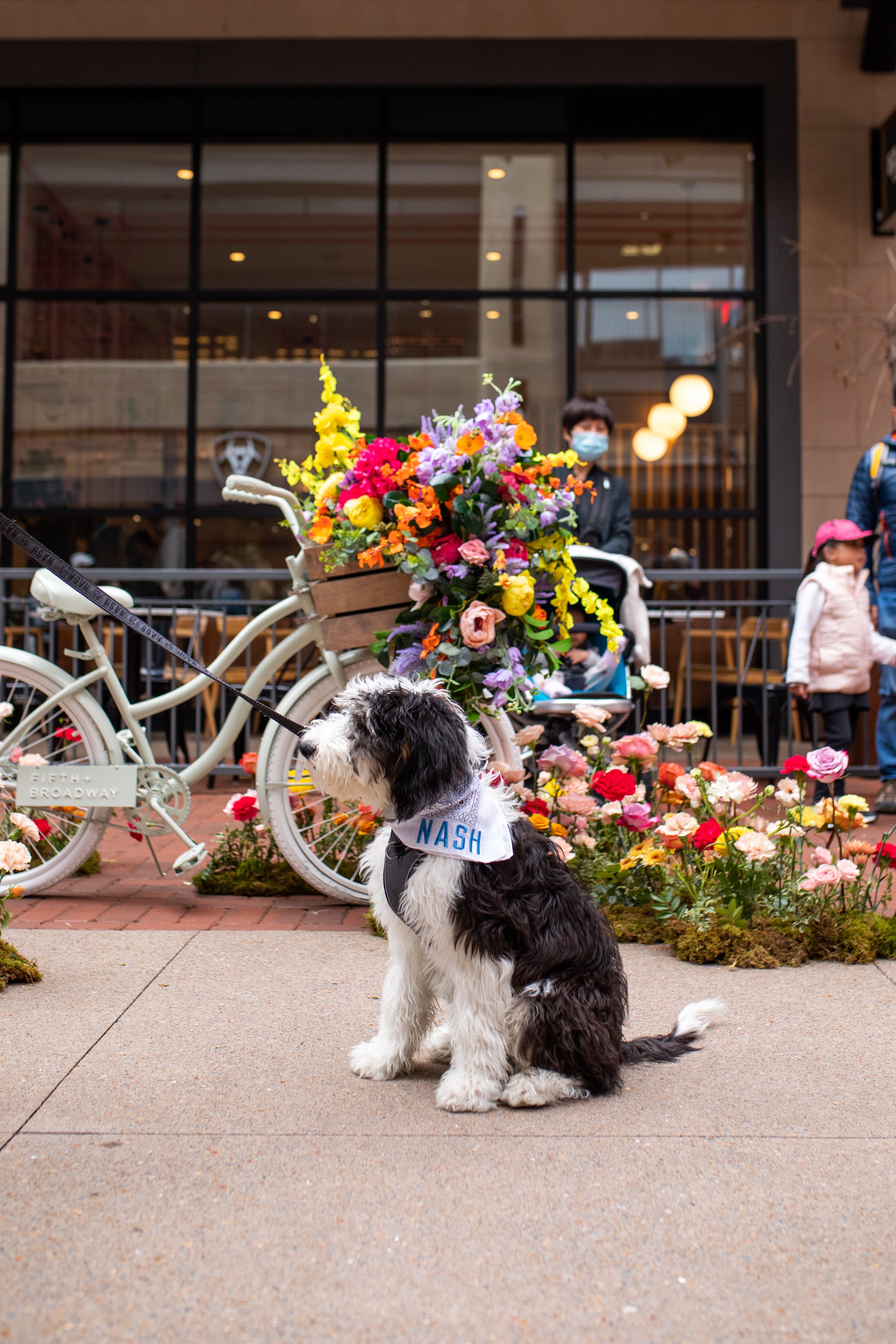 Vibrant floral installations composed of silk floral hues in pink, magenta, lavender, coral, orange, yellow, and mixed greens bring to life this spring Fifth + Broadway event in Nashville, TN. Design by Rosemary and Finch.