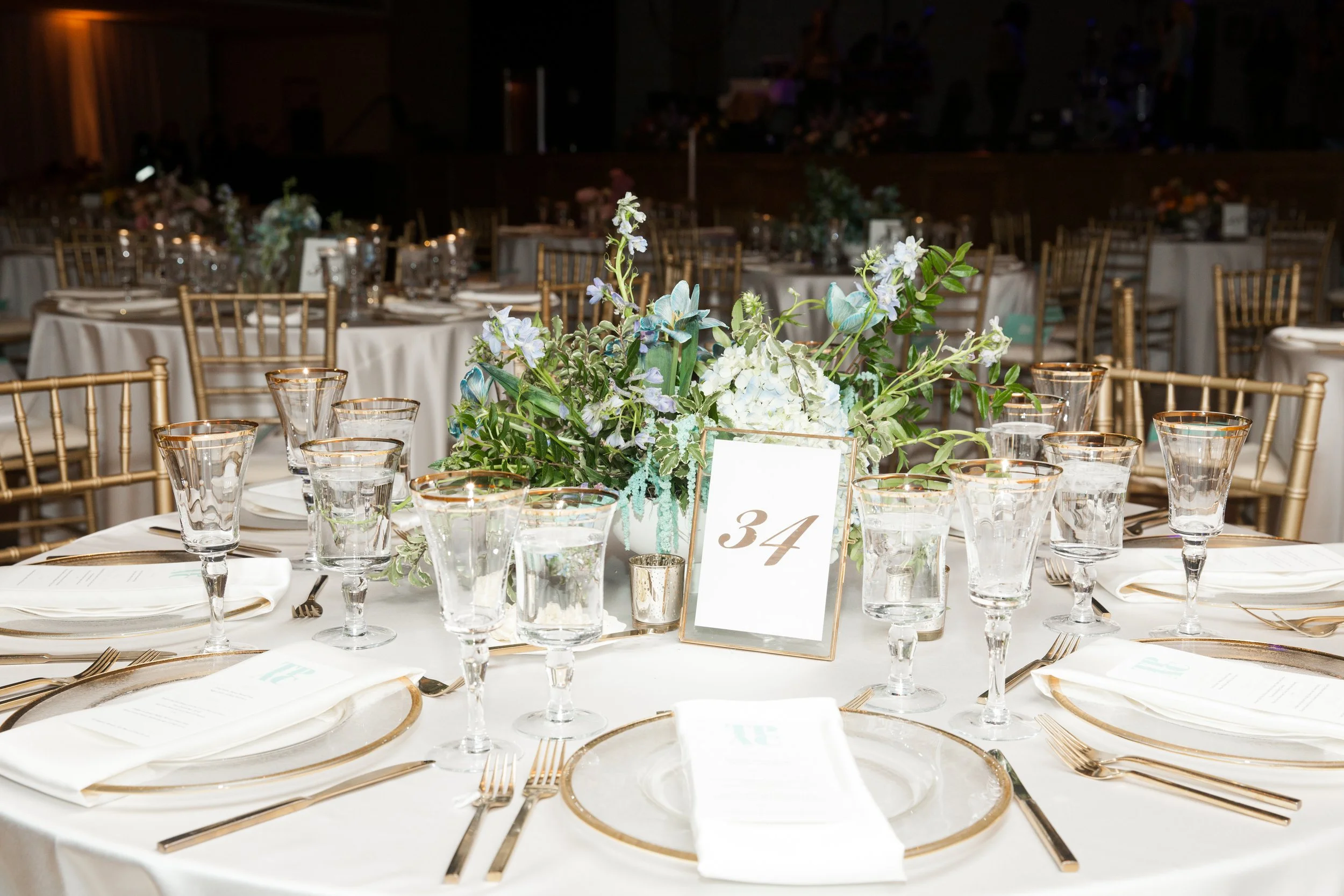 Modern and colorful centerpieces create a lively space for the TPAC Gala in Nashville, TN. Color-blocked floral hues of pink, red, yellow, blue comprised of roses, hydrangeas, tulips, ranunculus, pampas grass, carnations, and sweet peas. Designed by