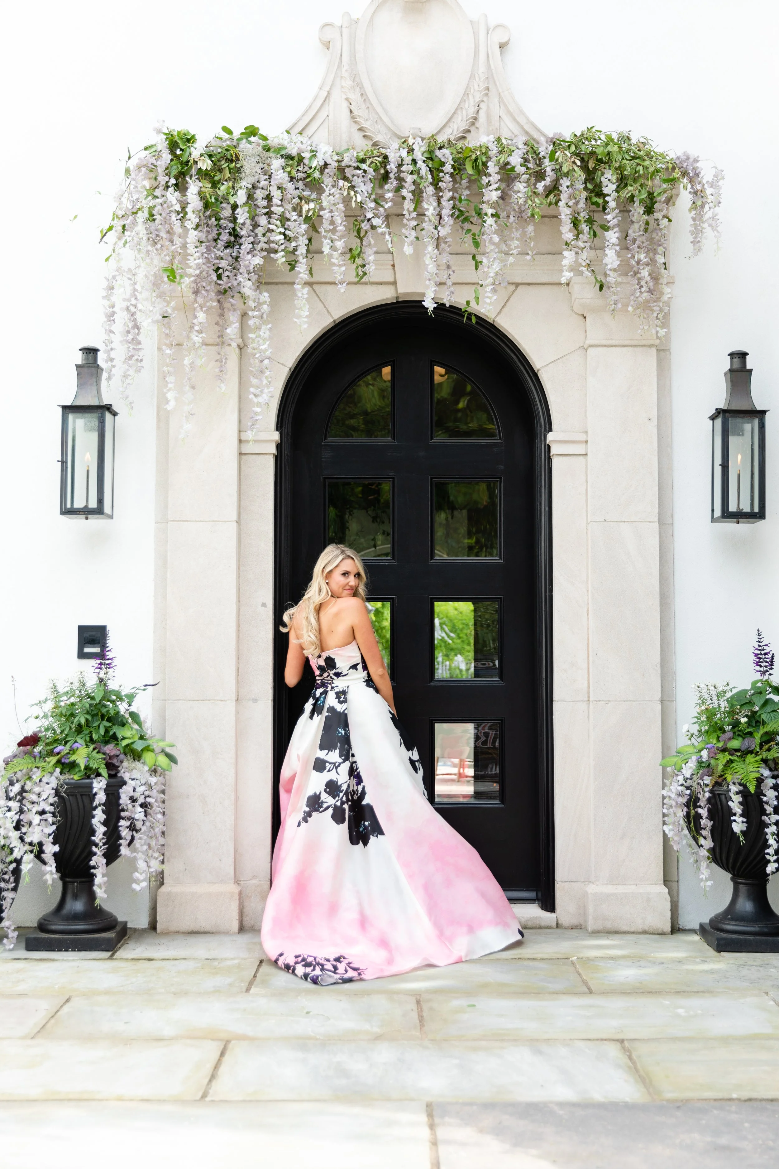 Bridgerton inspired engagement party at a private home in Nashville, TN with lush, organic floral installations of wisteria, spanish moss, and pastel blooms. Nashville wedding floral designer, Rosemary & Finch.