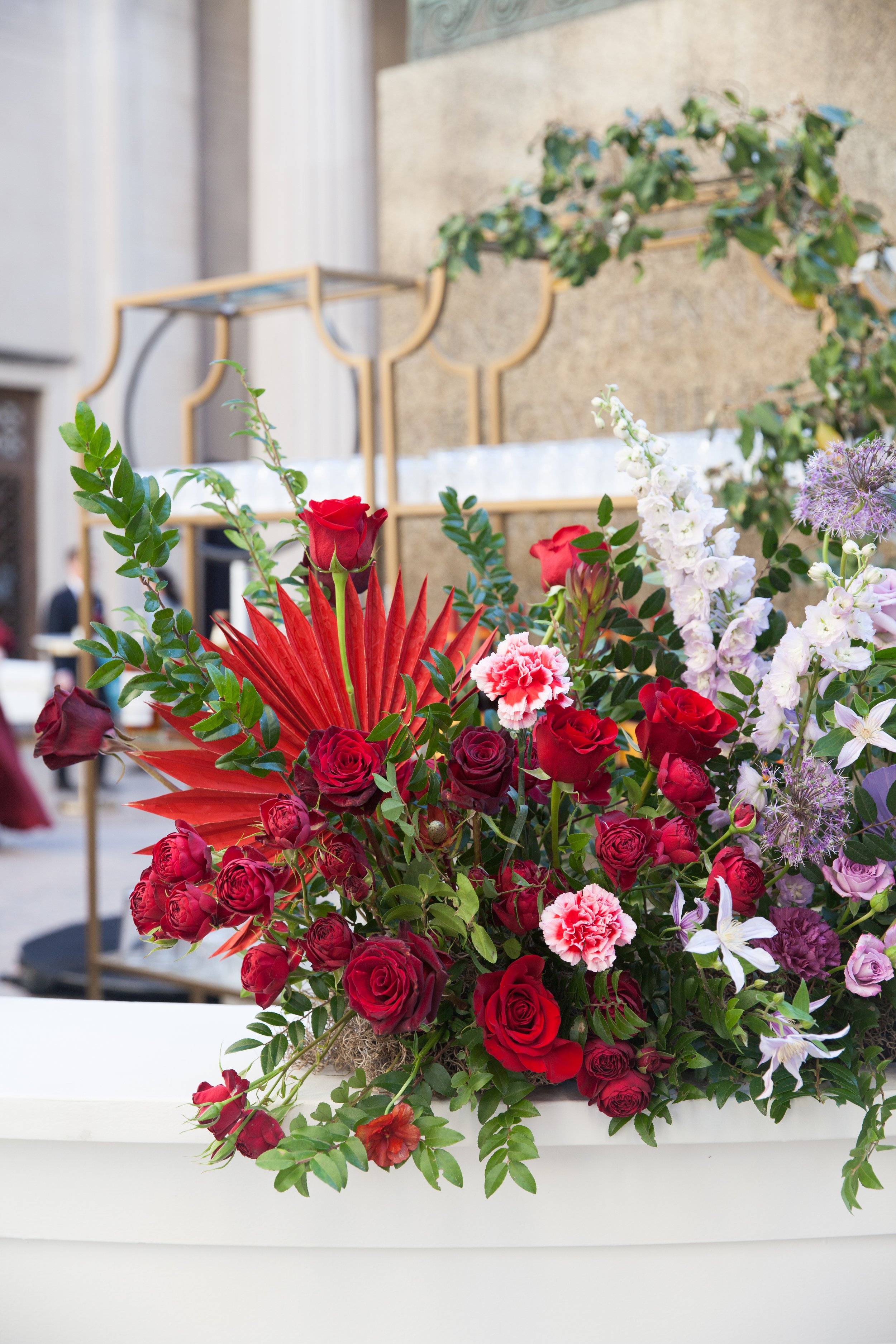 Bright and colorful arrangements create an inviting scene for guests at the TPAC Gala in Nashville Tennessee. Florals composed of roses, hydrangeas, tulips, snapdragons, dried palm, and anthurium. Designed by Rosemary and Finch.