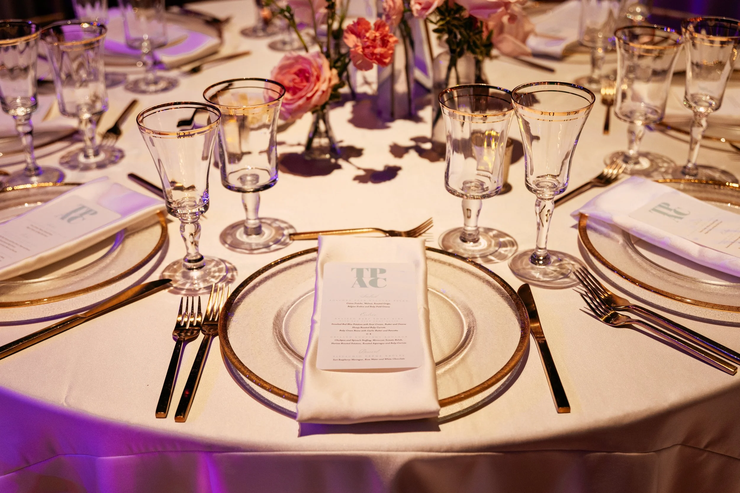Modern and colorful centerpieces create a lively space for the TPAC Gala in Nashville, TN. Color-blocked floral hues of pink, red, yellow, blue comprised of roses, hydrangeas, tulips, ranunculus, pampas grass, carnations, and sweet peas. Designed by