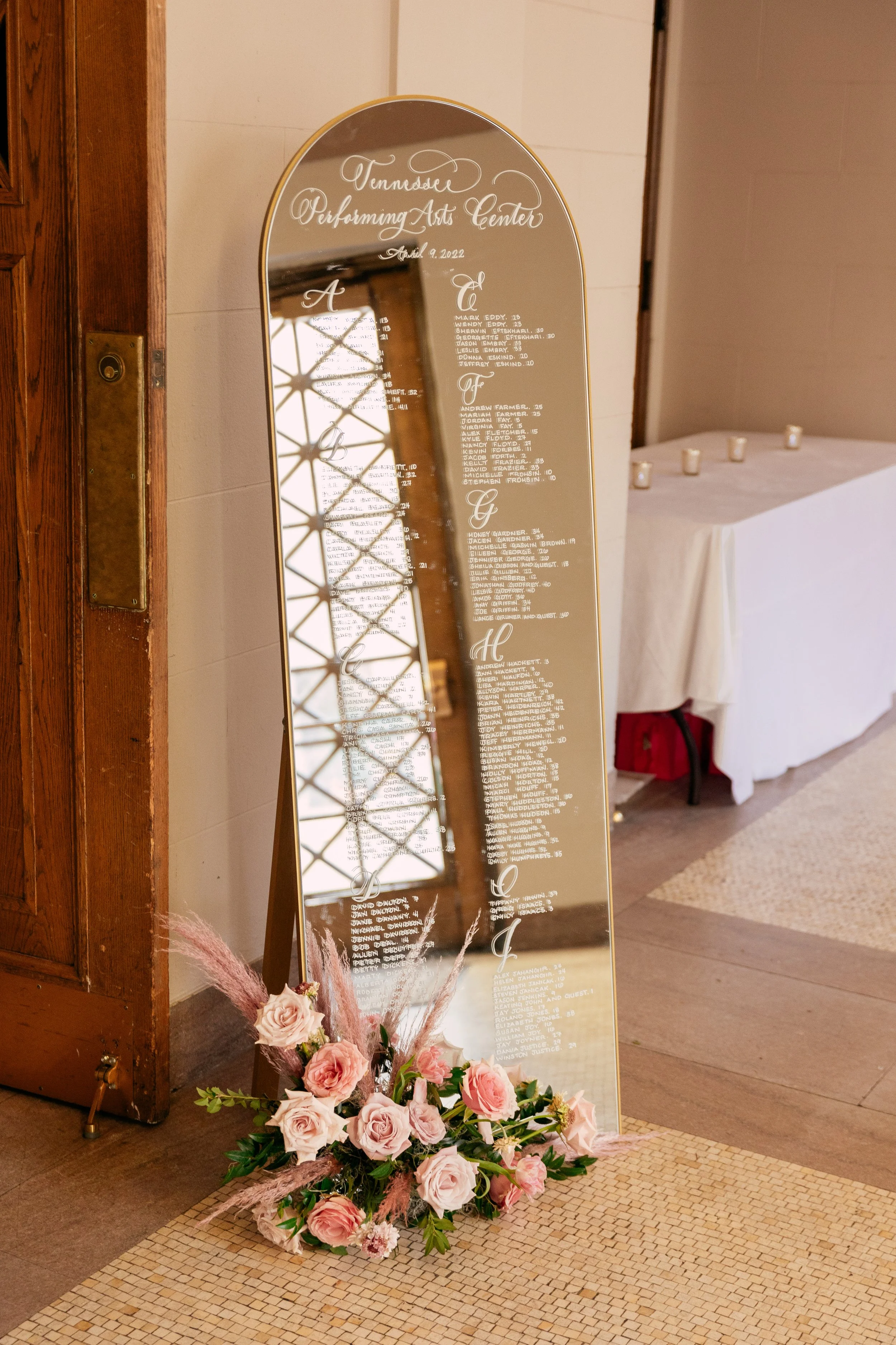 Bright and colorful arrangements create an inviting scene for guests at the TPAC Gala in Nashville Tennessee. Florals composed of roses, hydrangeas, tulips, snapdragons, dried palm, and anthurium. Designed by Rosemary and Finch.