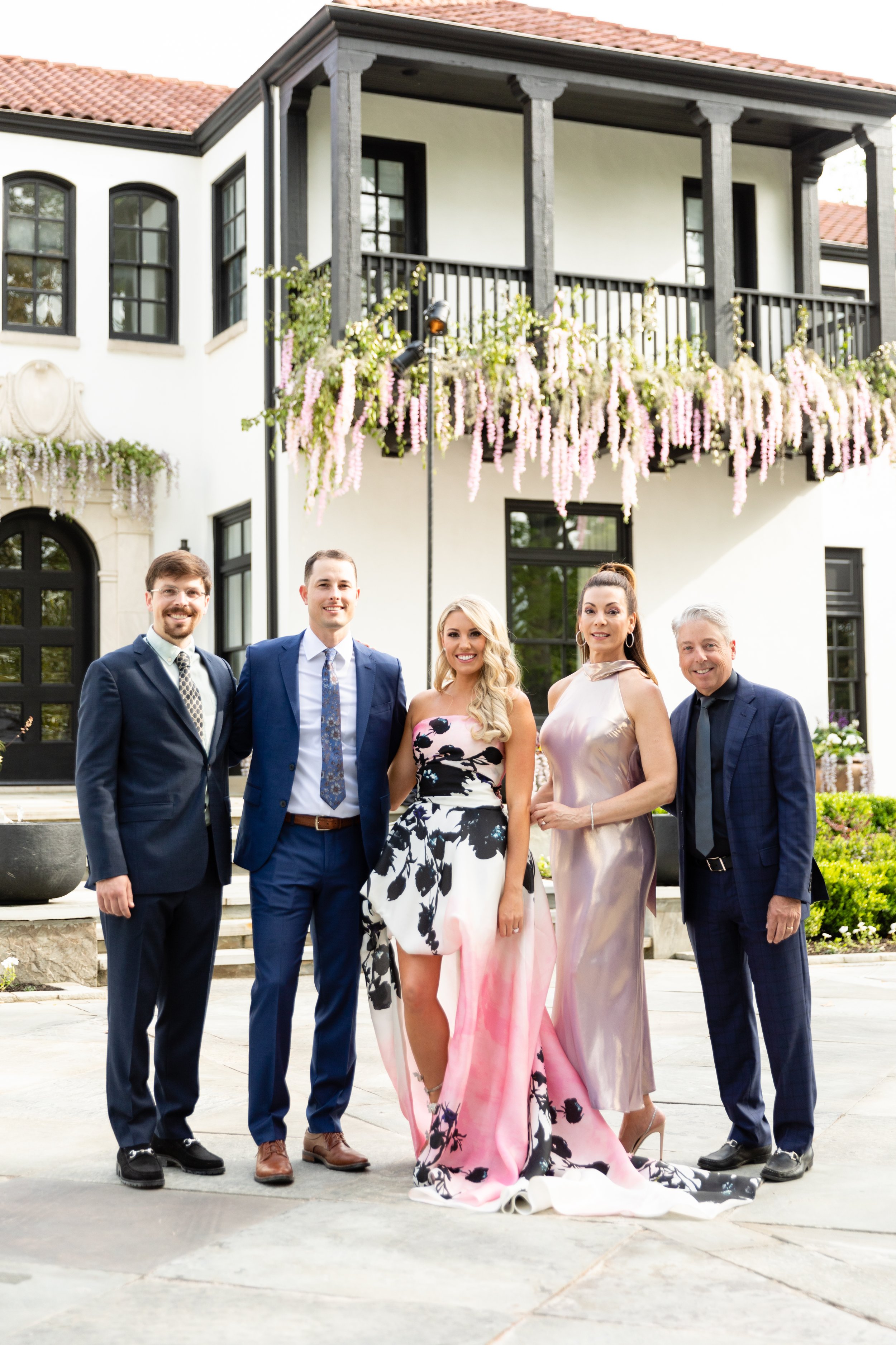 Bridgerton inspired engagement party at a private home in Nashville, TN with lush, organic floral installations of wisteria, spanish moss, and pastel blooms. Nashville wedding floral designer, Rosemary & Finch.