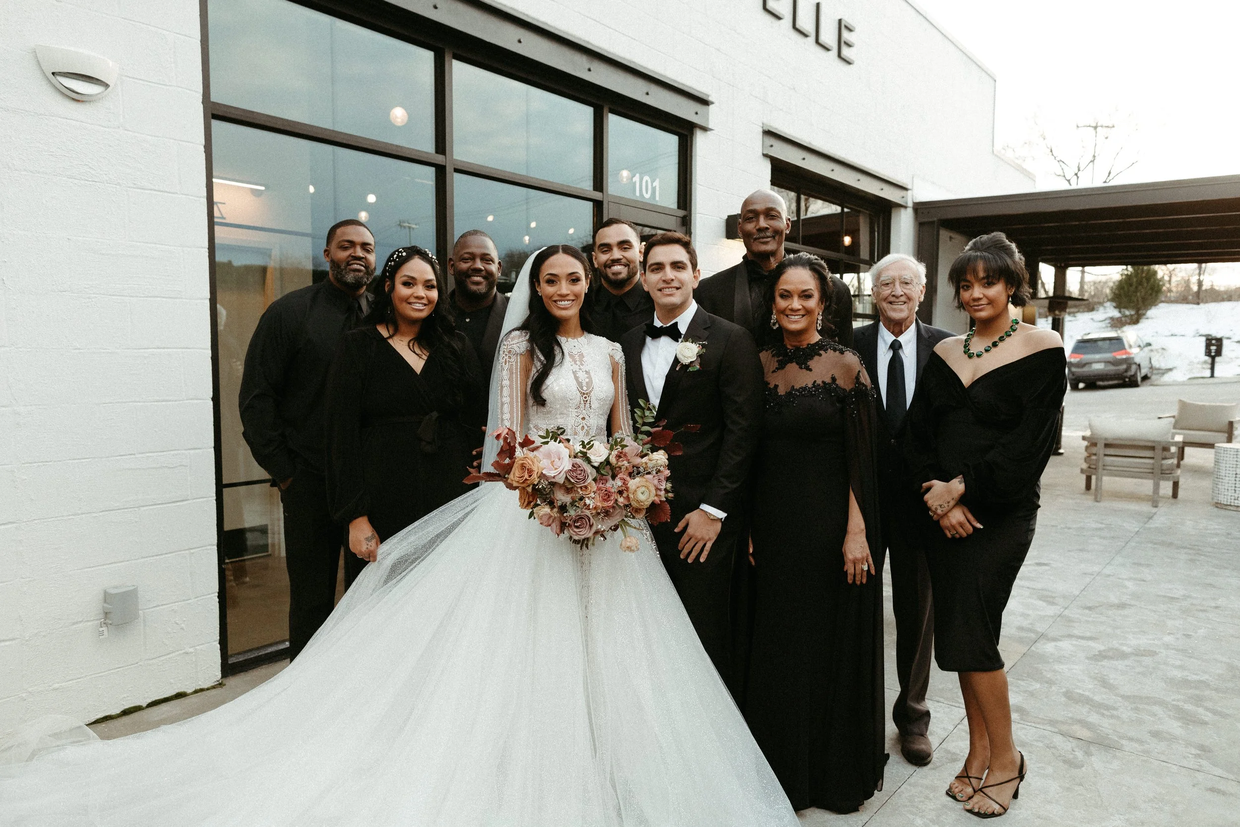 This elegant bridal bouquet brought hues of mauve, dusty pink, cream, burgundy, and terra cotta to this winter wedding. Lush with petal heavy roses, ranunculus, spray roses, copper beech, and greenery. Designed by Rosemary and Finch in Nashville, TN.
