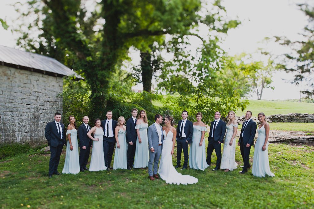 This romantic summer wedding was filled with classic white flowers and lush greenery and intimately hosted at a lovely private home. Designed by Rosemary and Finch in Nashville, TN.