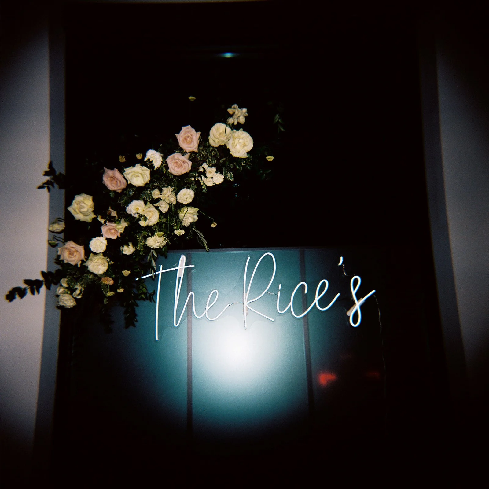 Classic white, cream, and blush wedding flowers. Florals composed of roses, ranunculus, Queen Anne’s lace, and greenery. Designed by Rosemary and Finch in Nashville, TN.