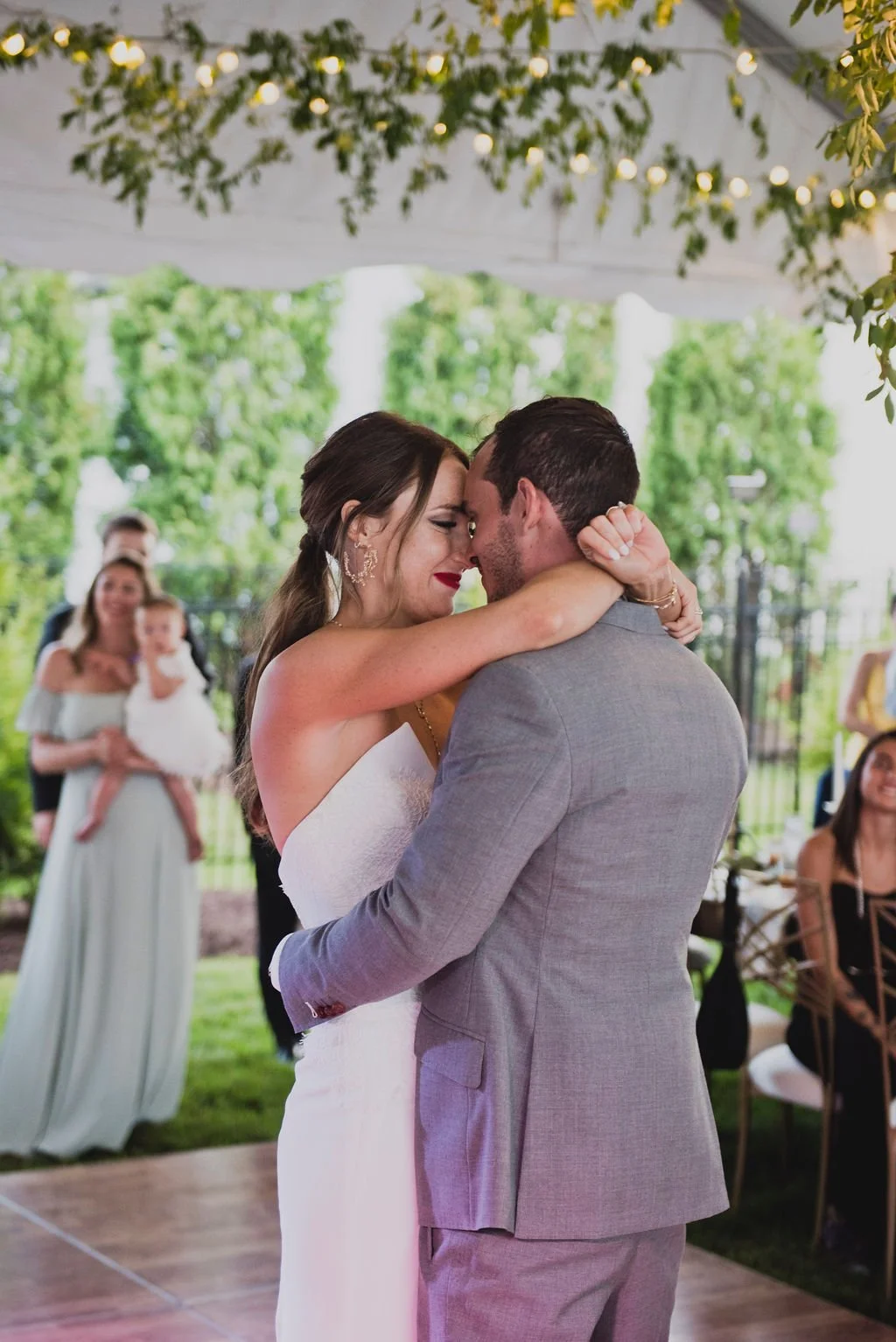 This romantic summer wedding was filled with classic white flowers and lush greenery and intimately hosted at a lovely private home. Designed by Rosemary and Finch in Nashville, TN.