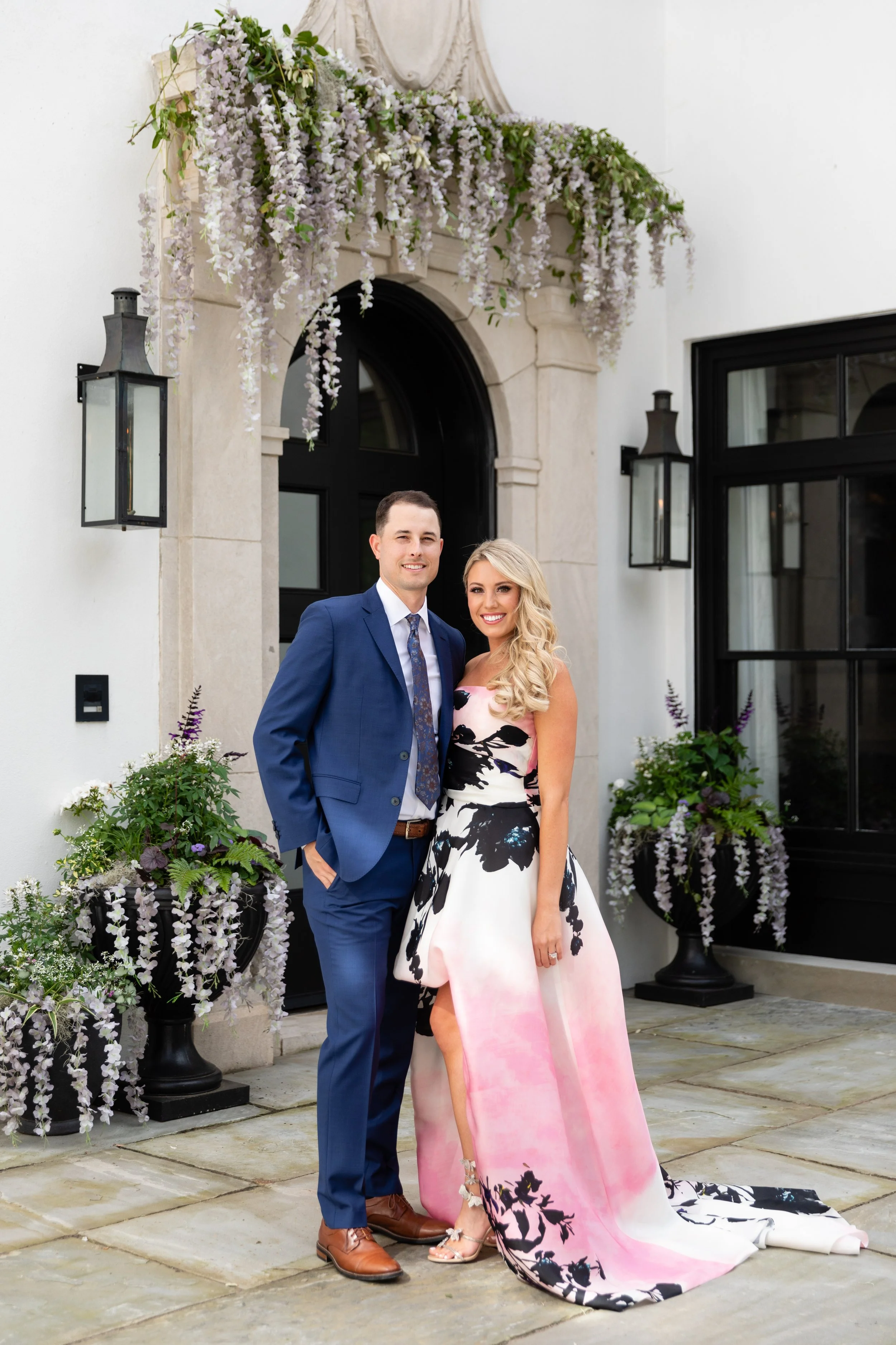 Bridgerton inspired engagement party at a private home in Nashville, TN with lush, organic floral installations of wisteria, spanish moss, and pastel blooms.