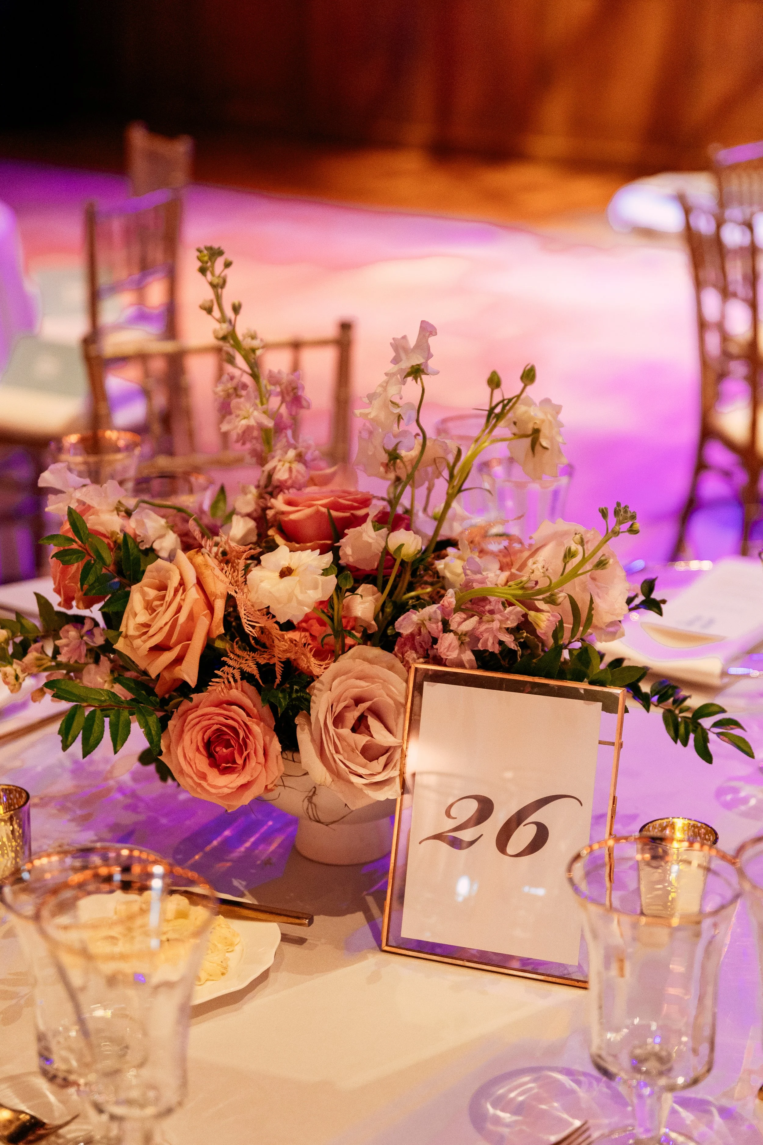 Modern and colorful centerpieces create a lively space for the TPAC Gala in Nashville, TN. Color-blocked floral hues of pink, red, yellow, blue comprised of roses, hydrangeas, tulips, ranunculus, pampas grass, carnations, and sweet peas. Designed by