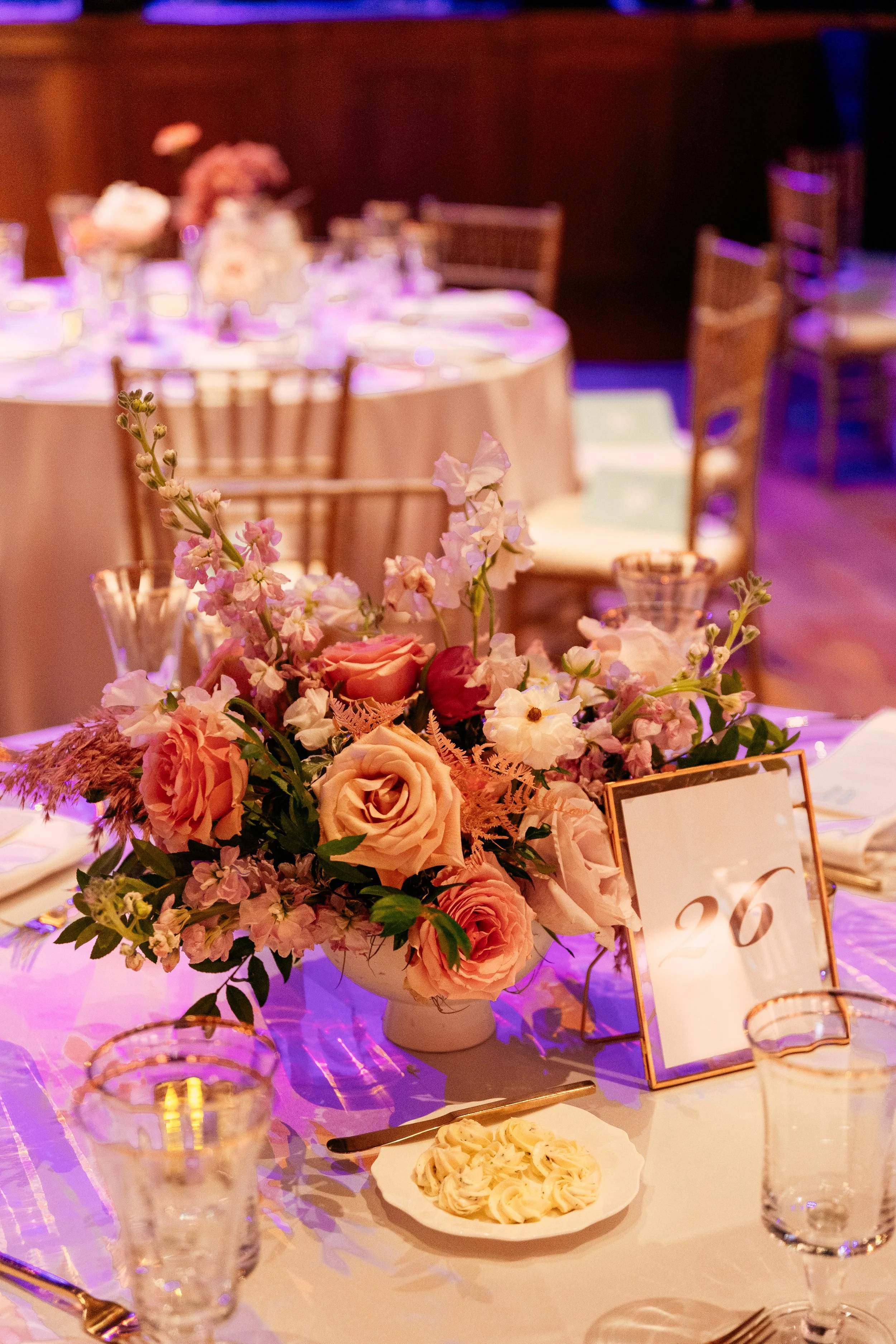 Modern and colorful centerpieces create a lively space for the TPAC Gala in Nashville, TN. Color-blocked floral hues of pink, red, yellow, blue comprised of roses, hydrangeas, tulips, ranunculus, pampas grass, carnations, and sweet peas. Designed by