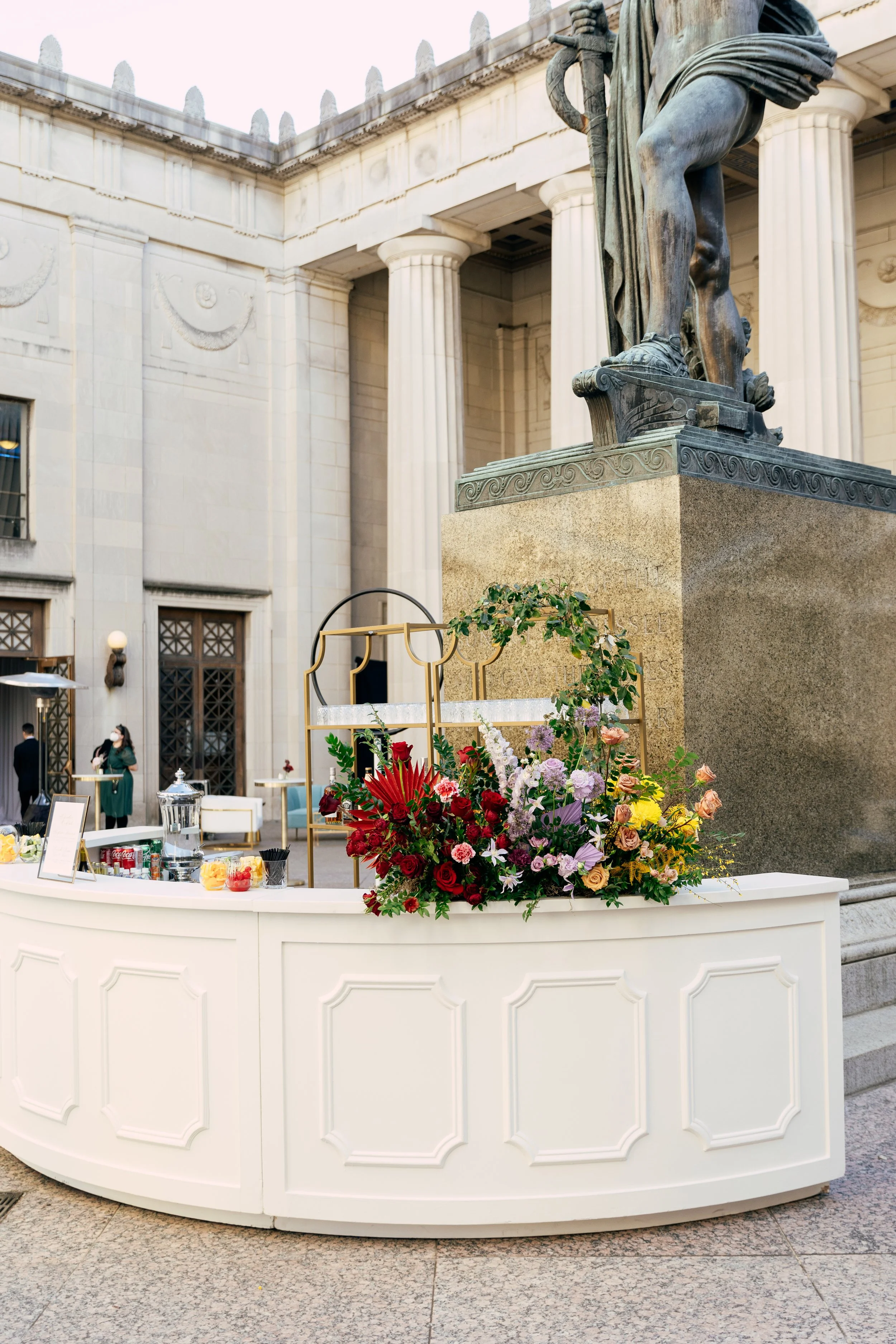 Bright and colorful arrangements create an inviting scene for guests at the TPAC Gala in Nashville Tennessee. Florals composed of roses, hydrangeas, tulips, snapdragons, dried palm, and anthurium. Designed by Rosemary and Finch.