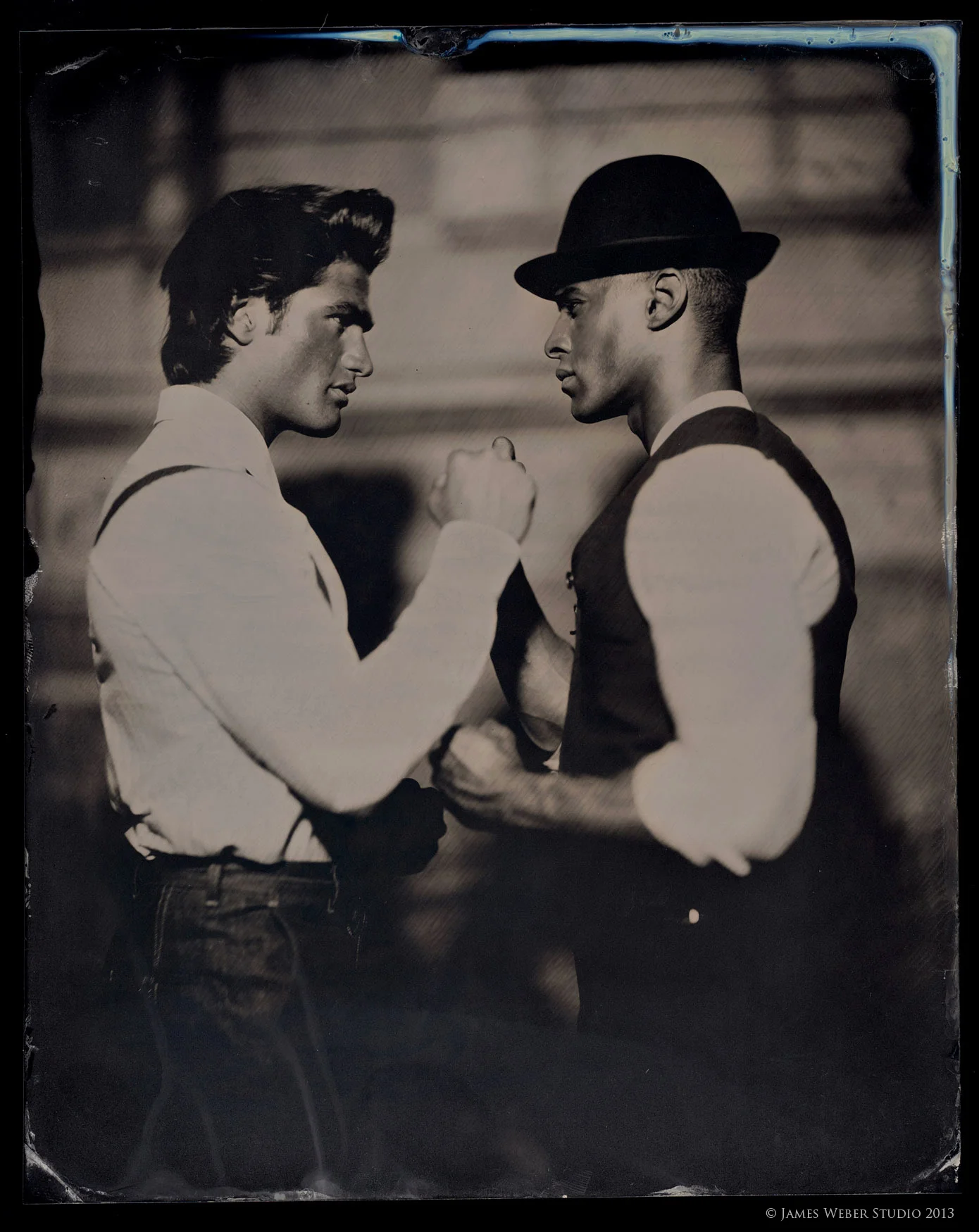Model: Baptiste(right), Korey(left)v @ RED NYC. On Baptiste: Trousers and shirt by Craig Robinson NY. On Derek: Shirt, Waistcoat, and Trousers - Craig Robinson NY. Vintage Hat 8"x10" on Black Aluminum. © James Weber 2013