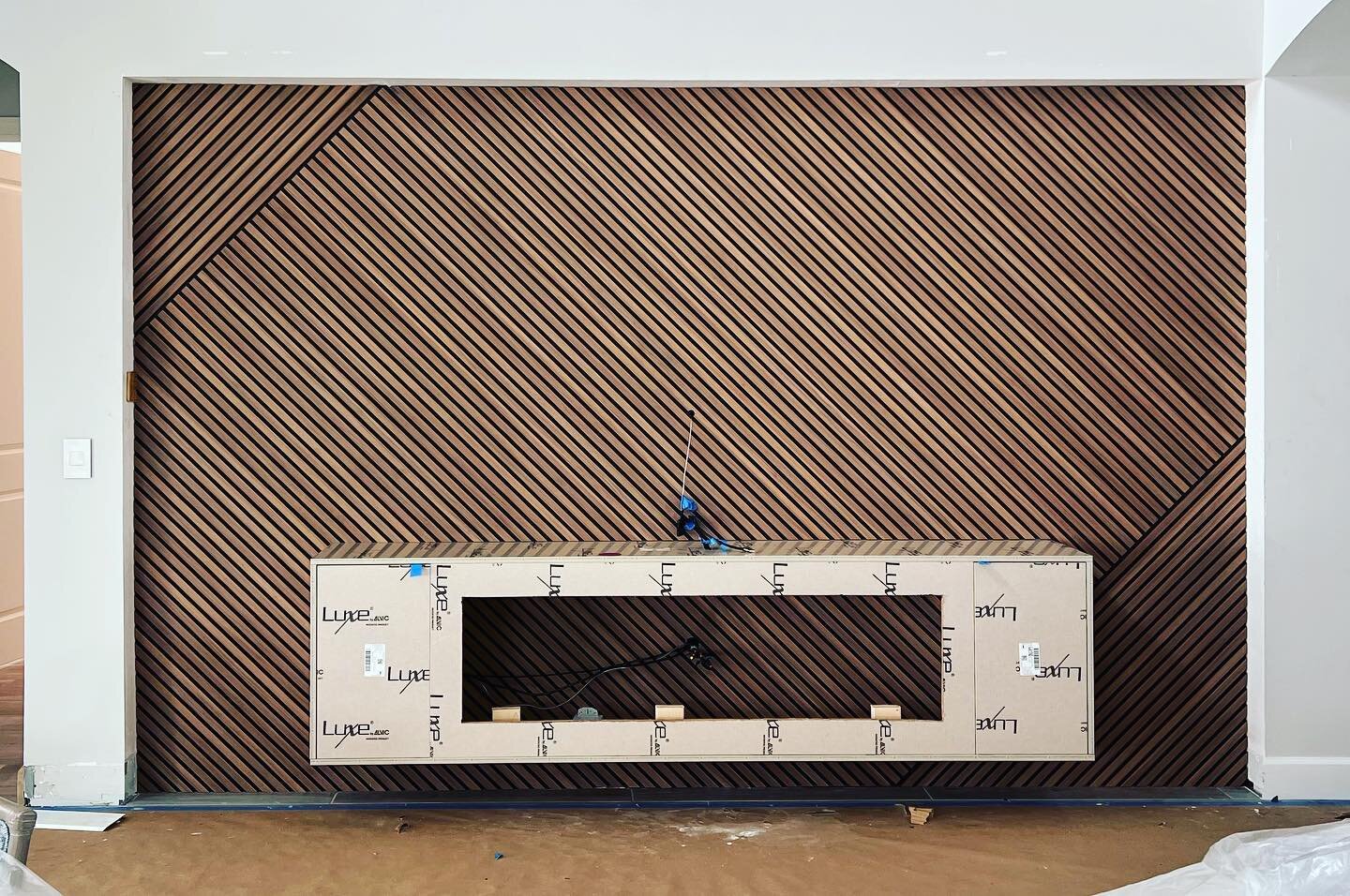 TV wall coming along nicely! @lioherusa @plywoodexpress_official #interiordesign #southfloridadesign #slatwall