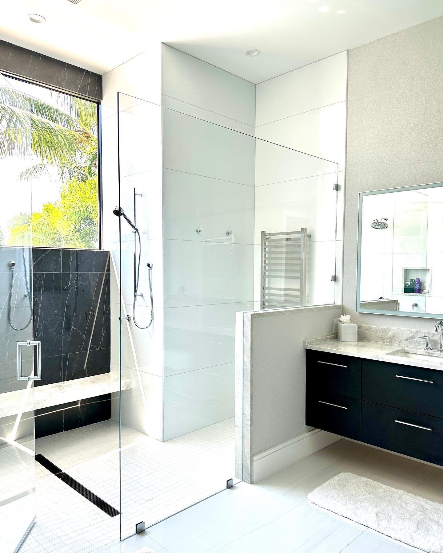 Love how this shower came out. Big massive windows to enjoy the beautiful Florida sky and foliage! #southfloridainteriordesigner #interiordesign #southflorida #bathroomdesign #outsidein #floridadesign @elementsandsurfaces