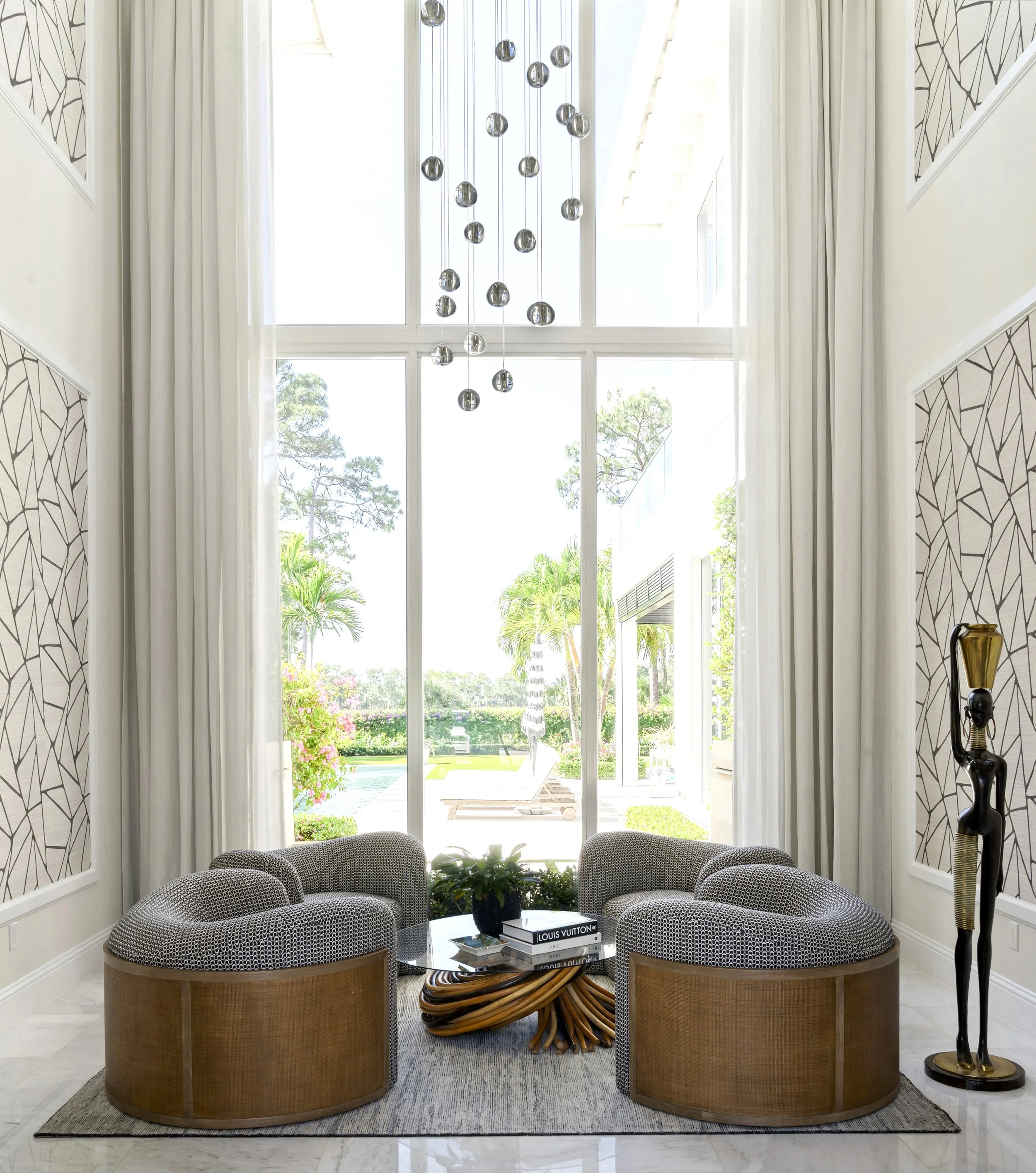 Old Palm Global Inspired - entry sitting area - vertical.jpeg