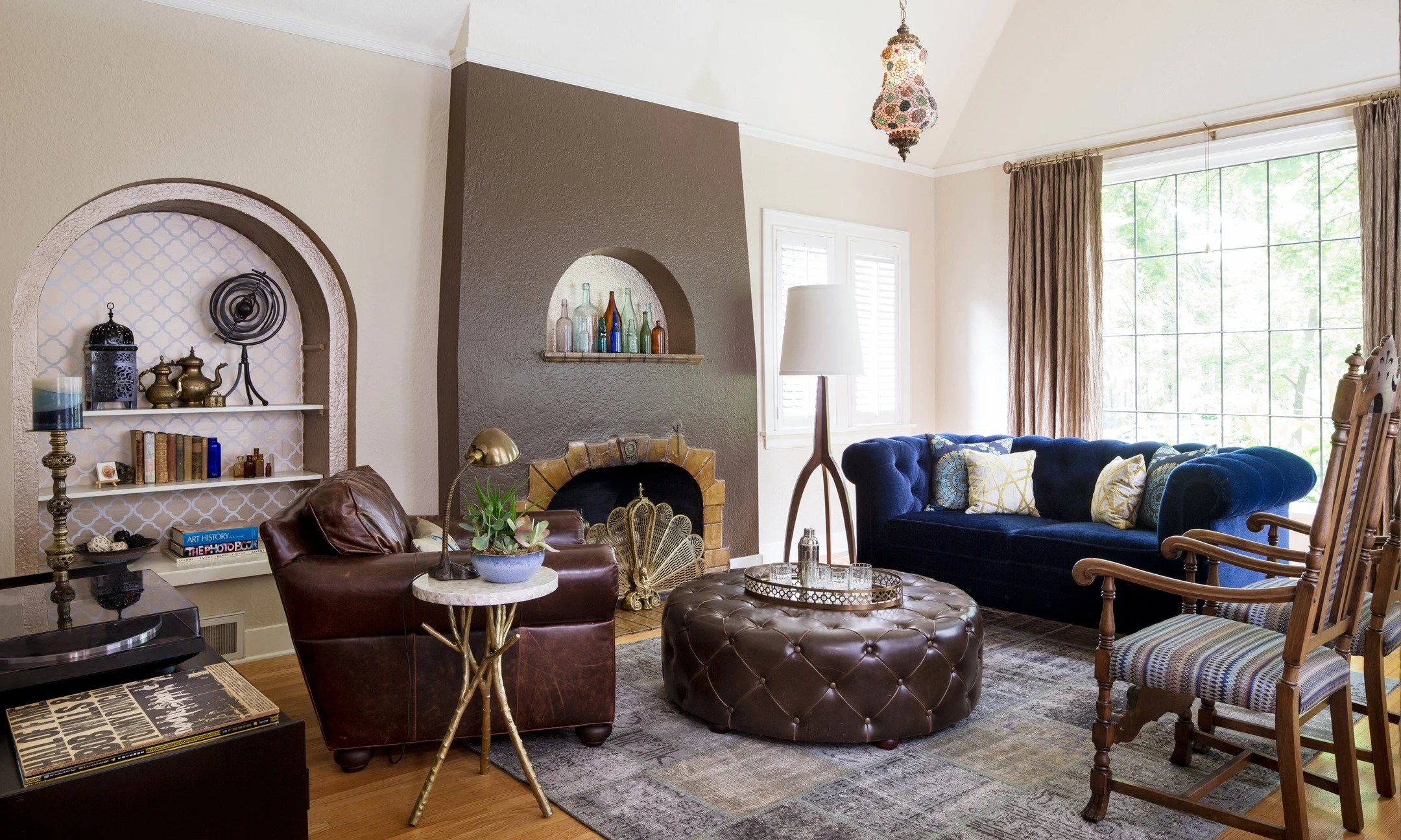 I miss working on historic homes. This one in Portland, Oregon was one of my favorites. It all started with the blue Chesterfield sofa and antique dining chairs. The rest of the room focused on cool vintage details, like the handmade pendant using re