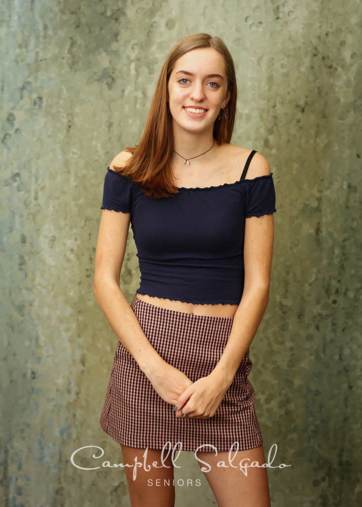  High school senior portrait photography of teen on rain dance background by senior picture photographers at Campbell Salgado Studio in Portland, Oregon. 