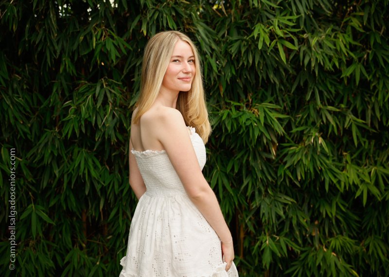  Portland senior pictures, portrait of teen on bamboo background by high school senior photographers at Campbell Salgado Studio in Portland, Oregon. 